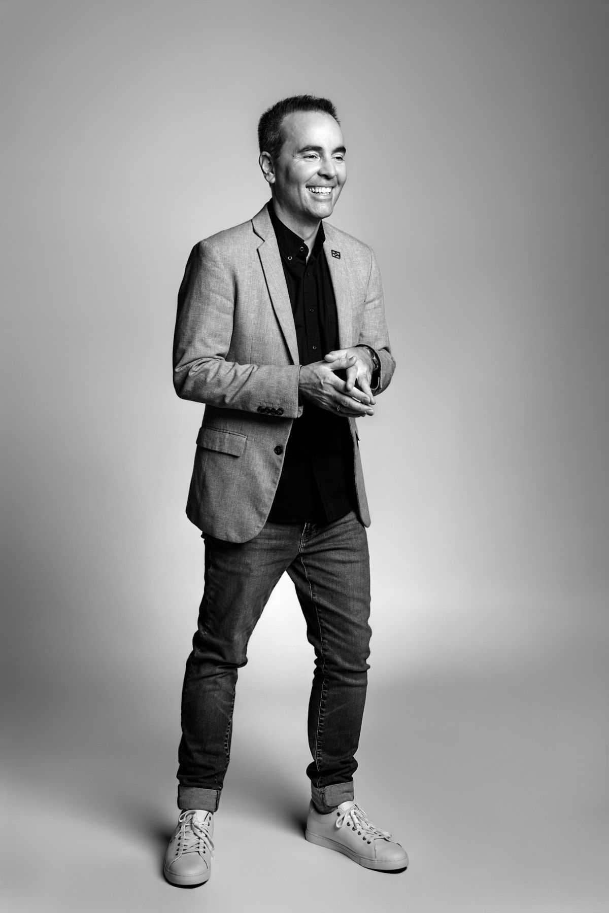 Black and white studio portrait for male founder shot by Sydney branding photographer Tammy TingTIng.