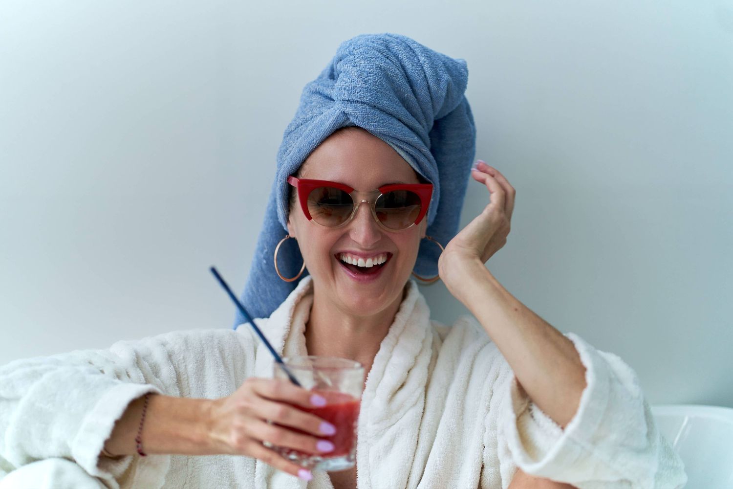Female founder smiling at camera in a relax lifestyle personal branding photo in Sydney by Studio TingTing.