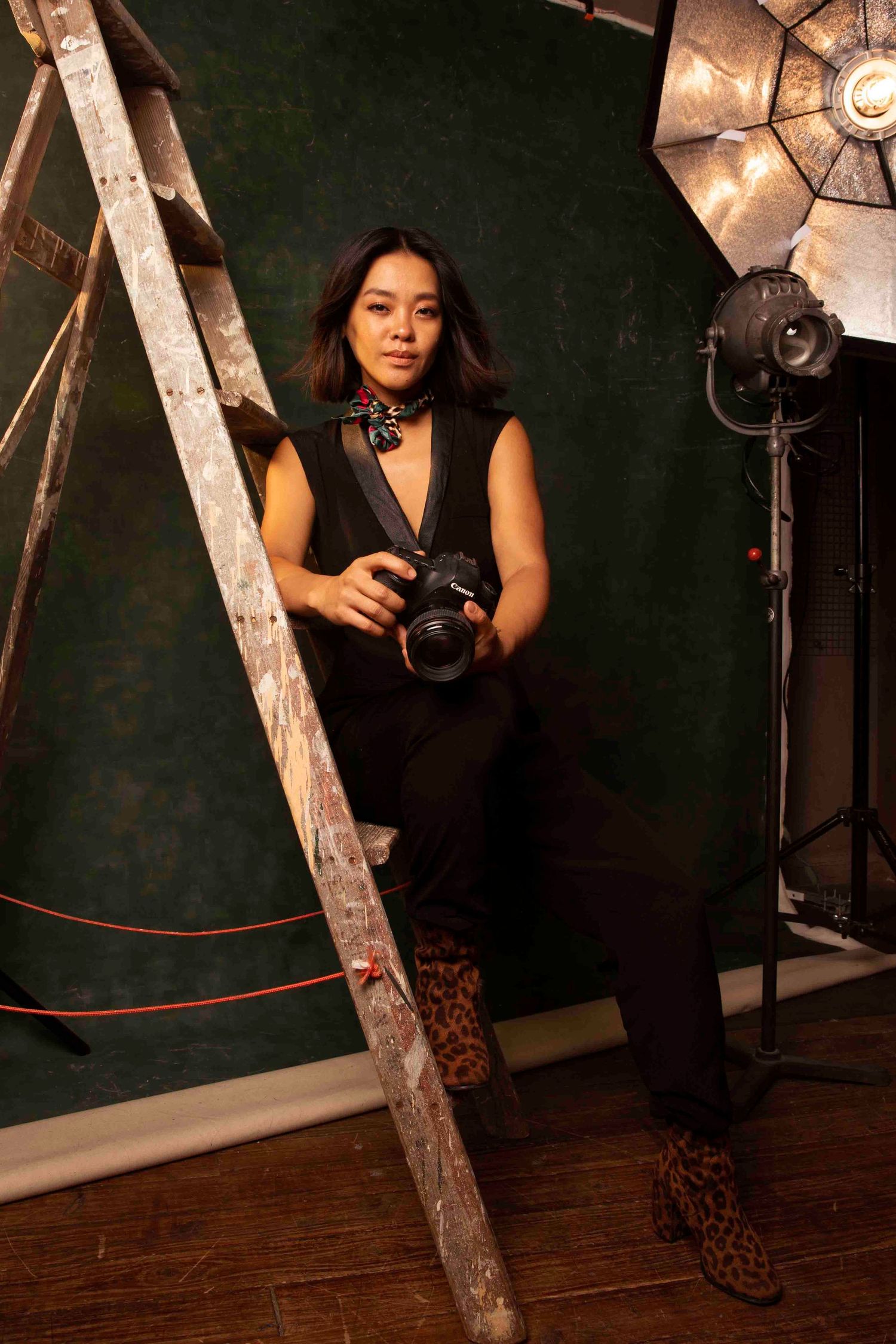 Sydney Professional photographer at work, demonstrating posing techniques for branding photography.
