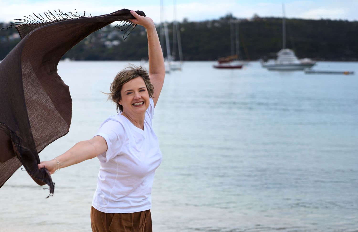 Lifestyle relax personal branding photo series of a nutritionist at balmoral beach sydney shot by Studio TingTing.
