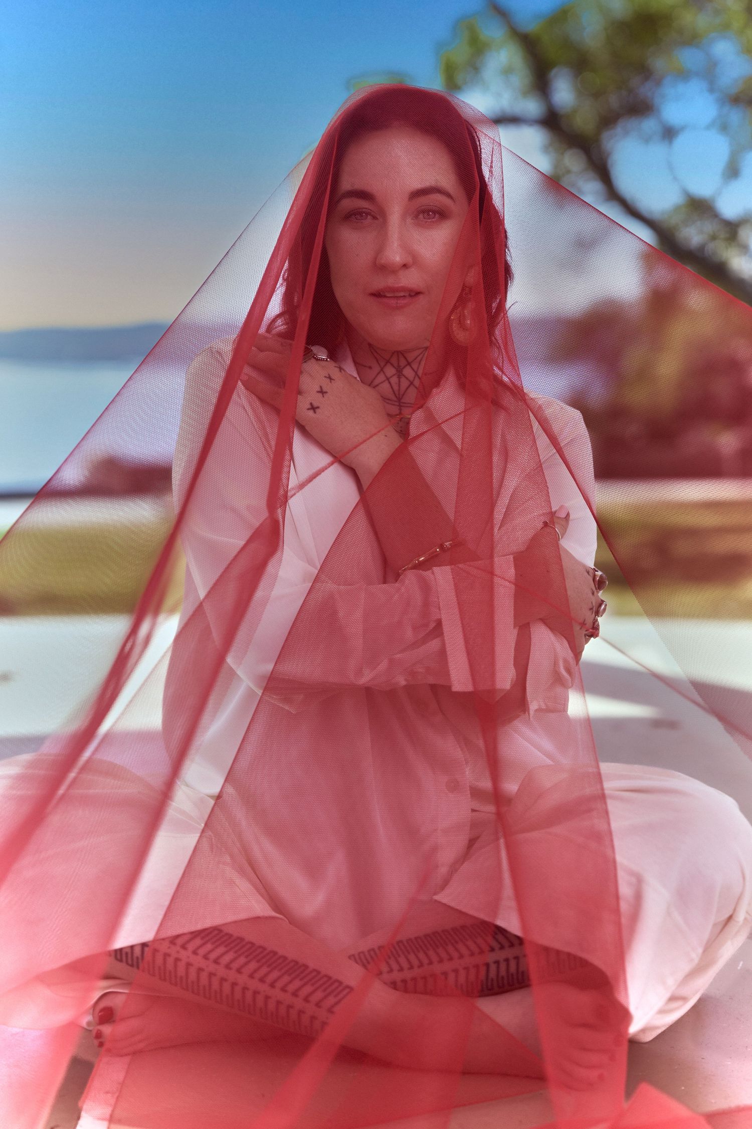 A central coast business mystic posing for personal branding photo shot by Studio TingTing in Sydney.