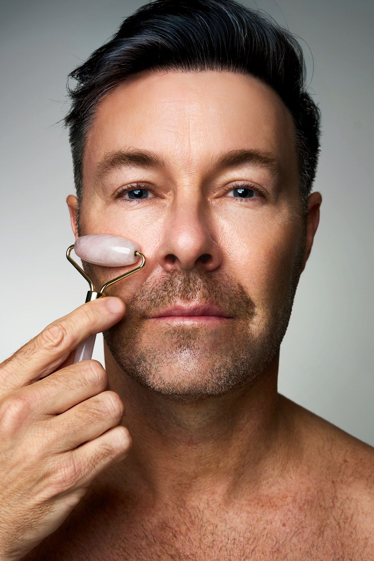 A sequence of male model showcasing skincare product. Shot by Sydney commercial photographer Tammy TingTing.