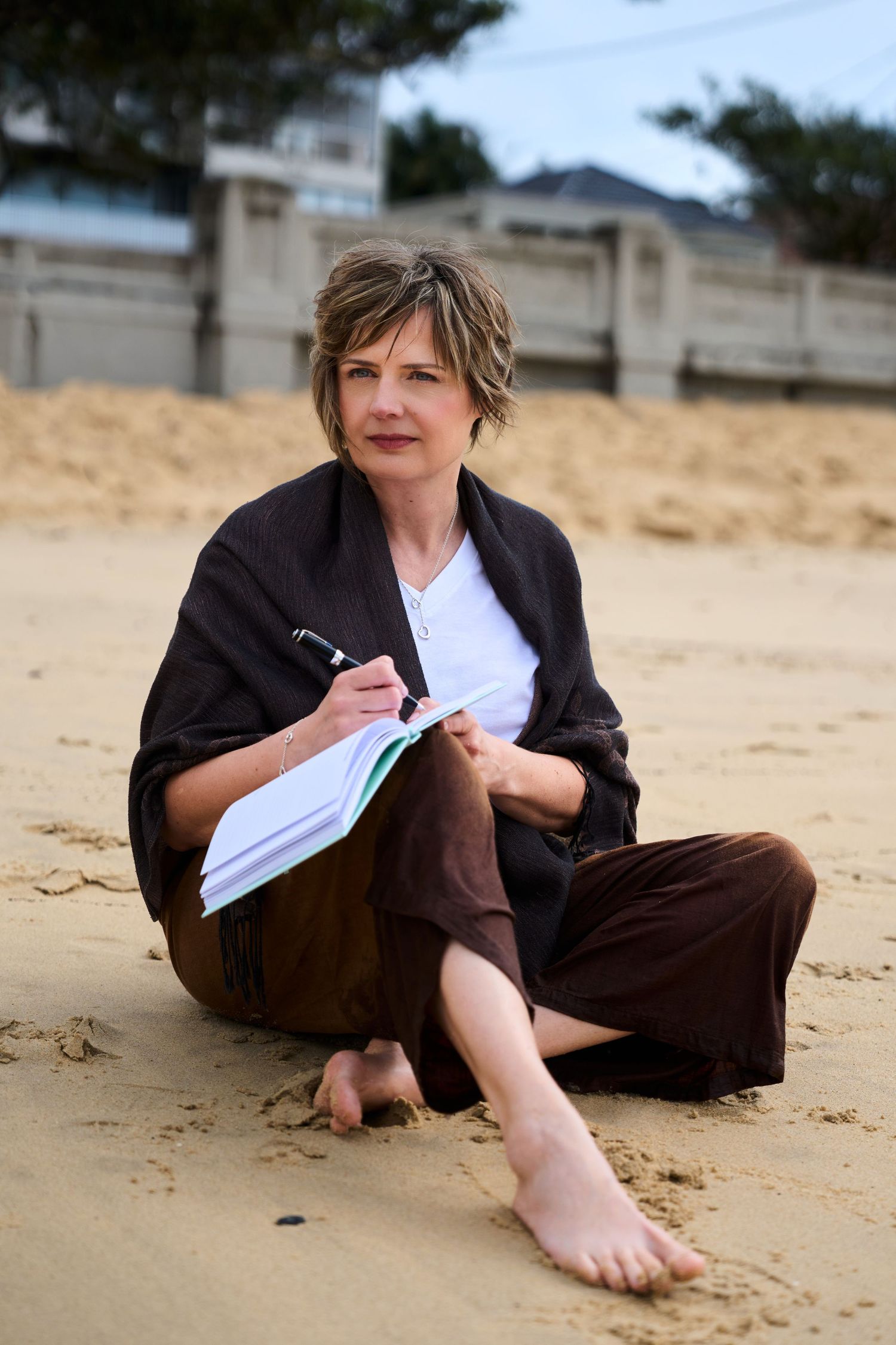 A nutritionist posing for relaxed lifestyle business photo on Balmoral beach in sydney. Shot by Studio TingTing.