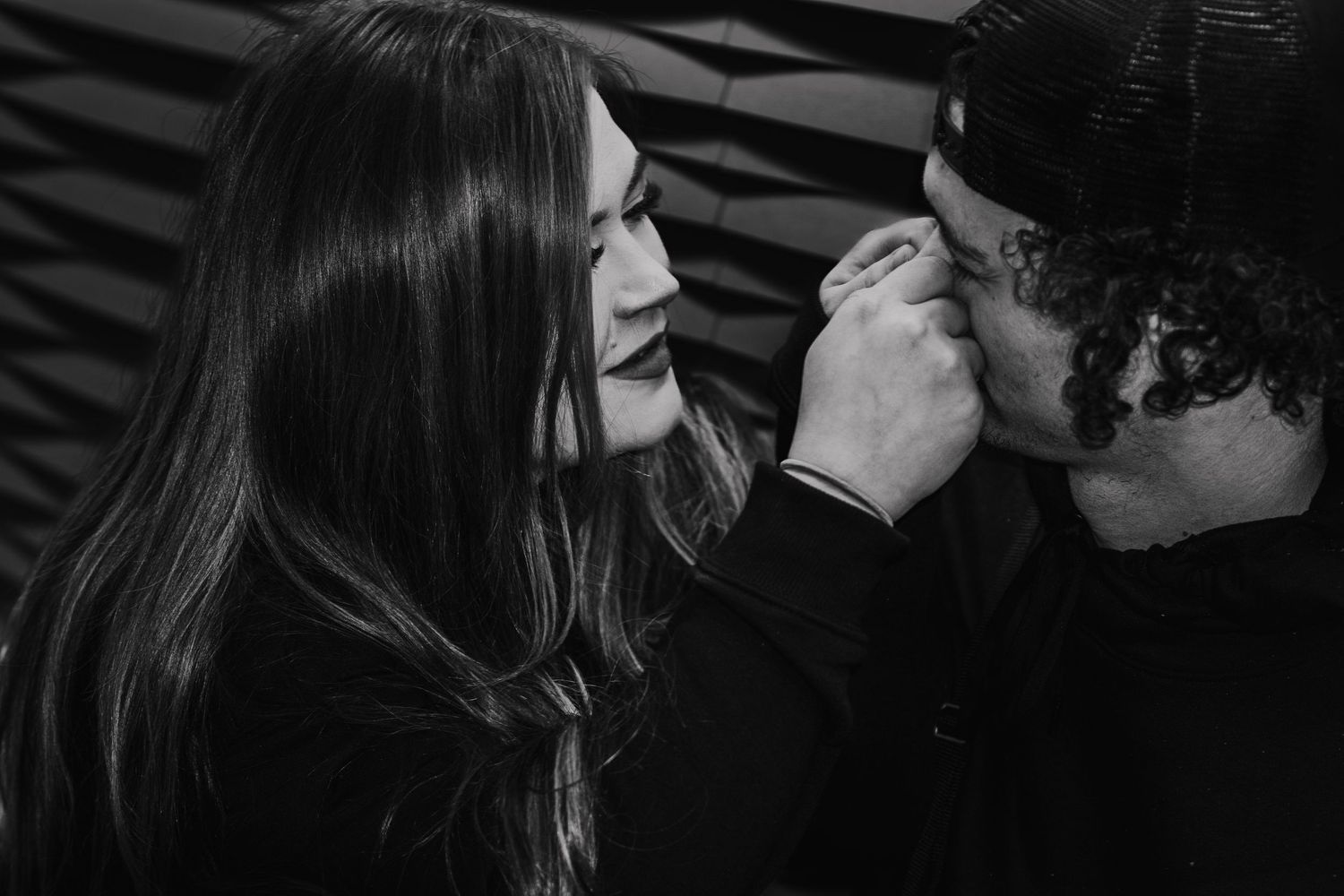 Black and white photo series showing intimate moments between two people in close conversation. A Night Out Productions.