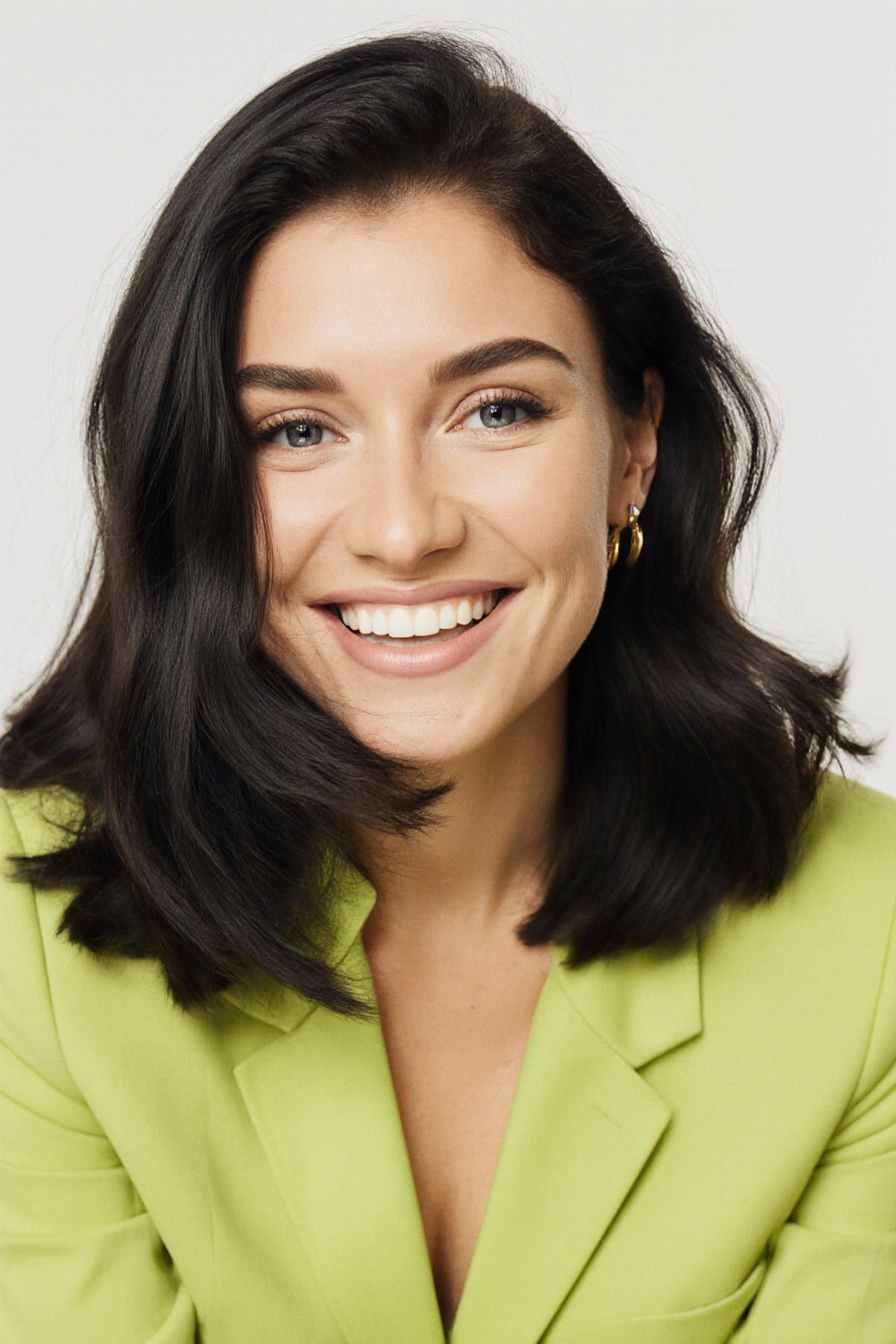 Portrait of  photographer Darina Derzkaya laughing during a studio shoot in Valencia.