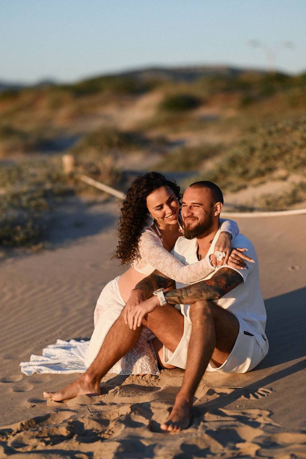 Client feedback about a maternity beach photoshoot, highlighting the photographer's ability to restore self-confidence and capture stunning