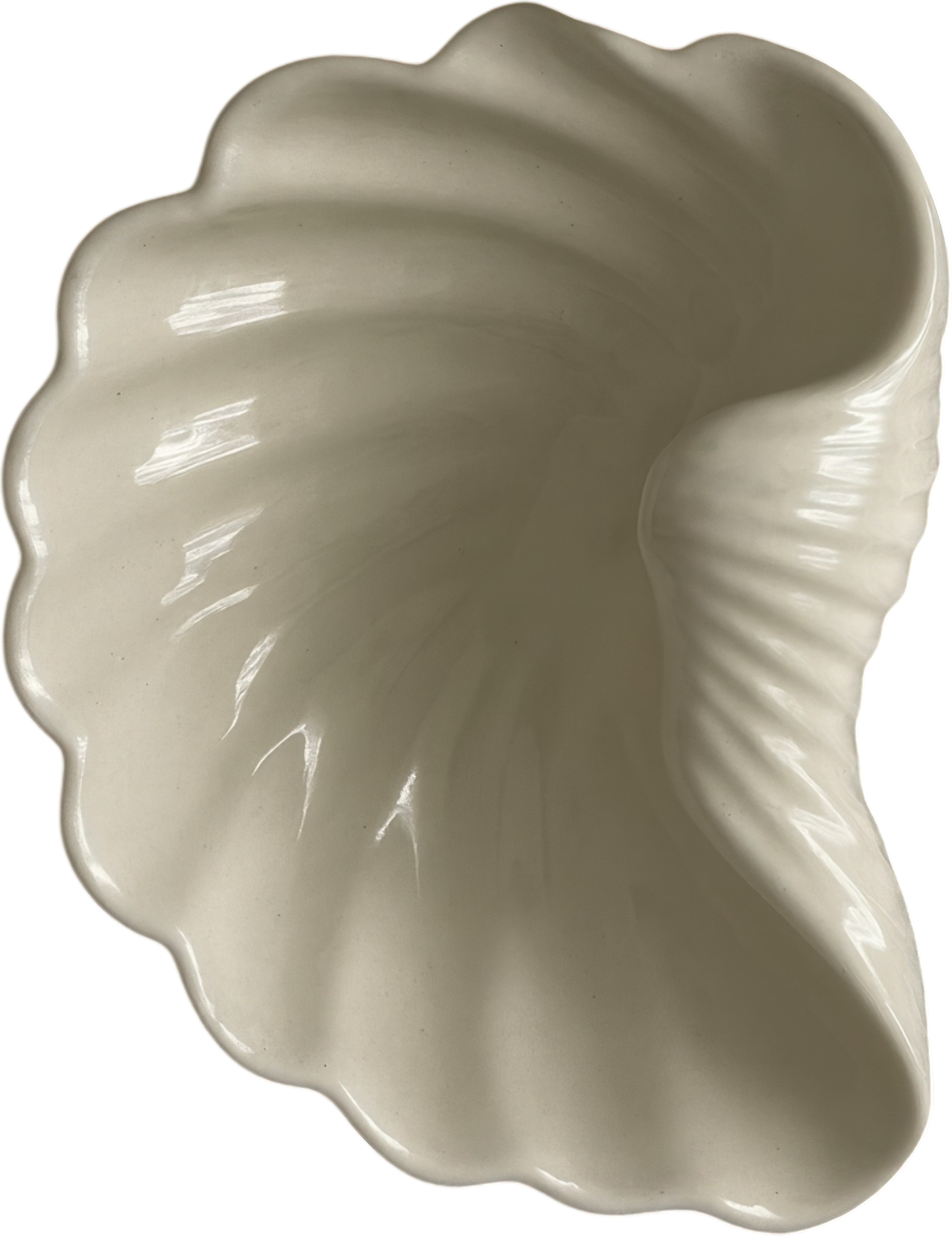Cream glazed ceramic seashell-shaped decorative dish with ribbed texture and glossy finish, ideal for trinkets or serving.