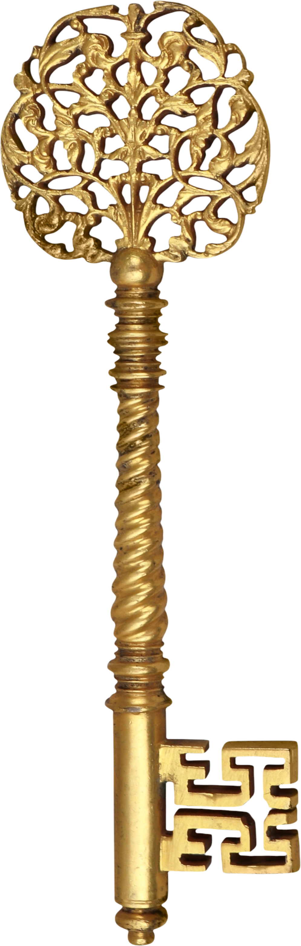 Ornate golden skeleton key with intricate filigree bow, twisted shaft, and decorative bit on white background.