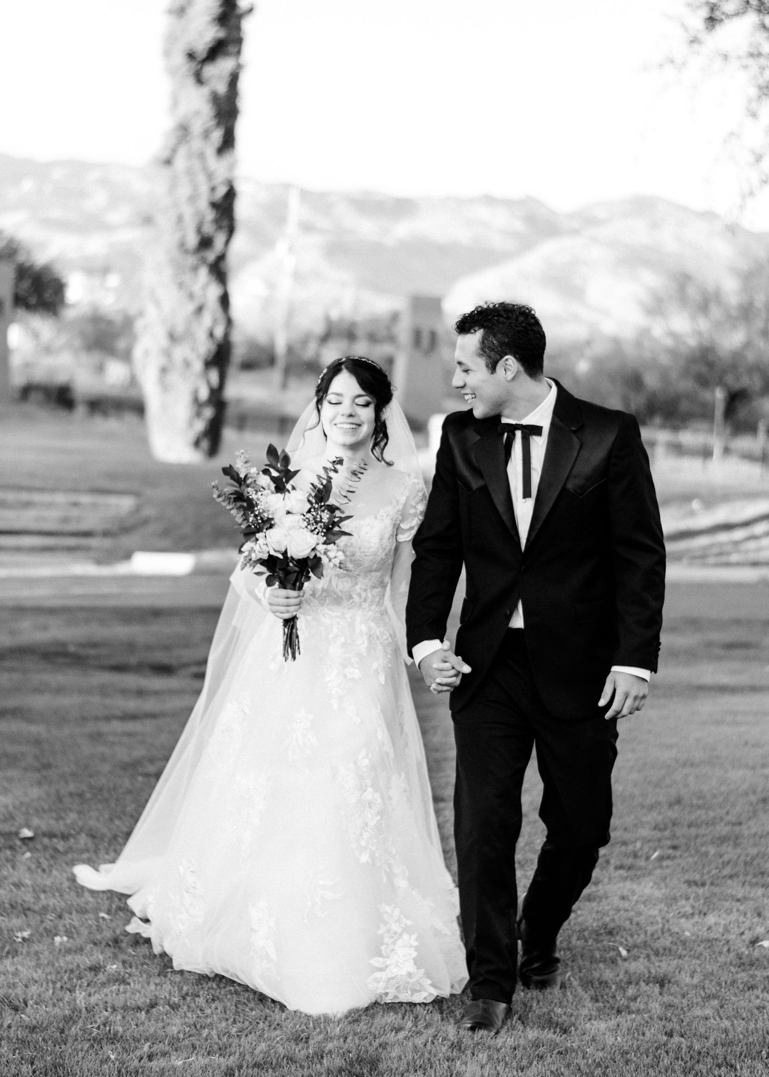 Newlywed couple sharing a kiss after their Tucson wedding ceremony