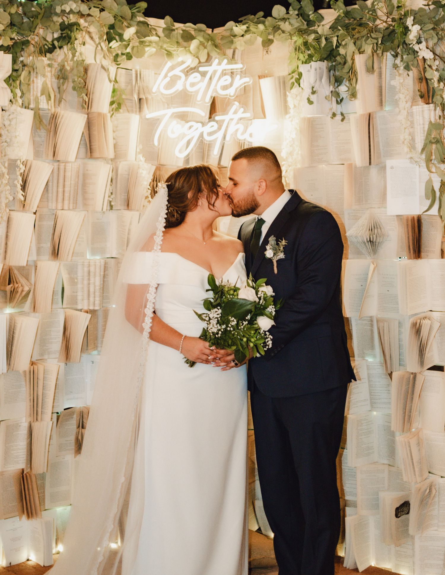 Newlywed couple sharing a kiss after their Tucson wedding ceremony, backyard wedding, civil Tucson wedding