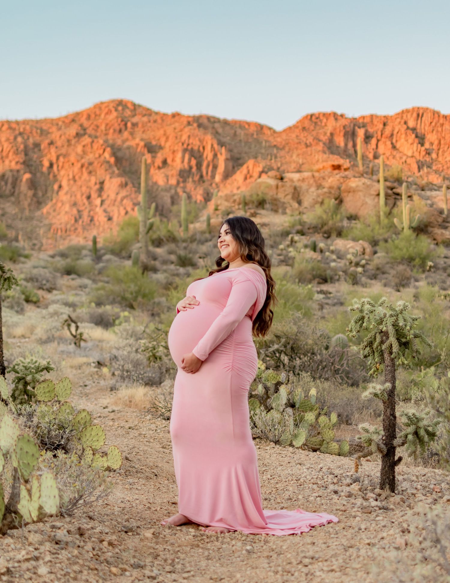 Arizona maternity photography — glowing mom-to-be in scenic outdoor setting, sunset tucson