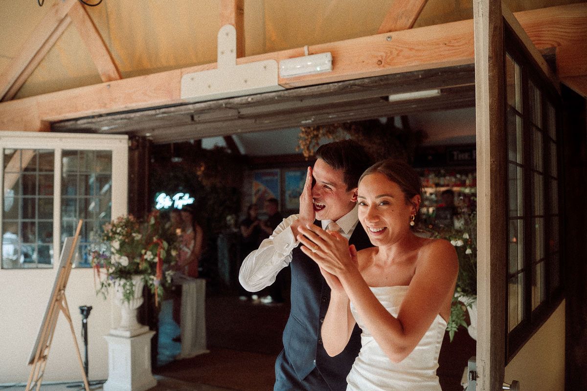 A couple shares a romantic dance together during their wedding reception celebration.