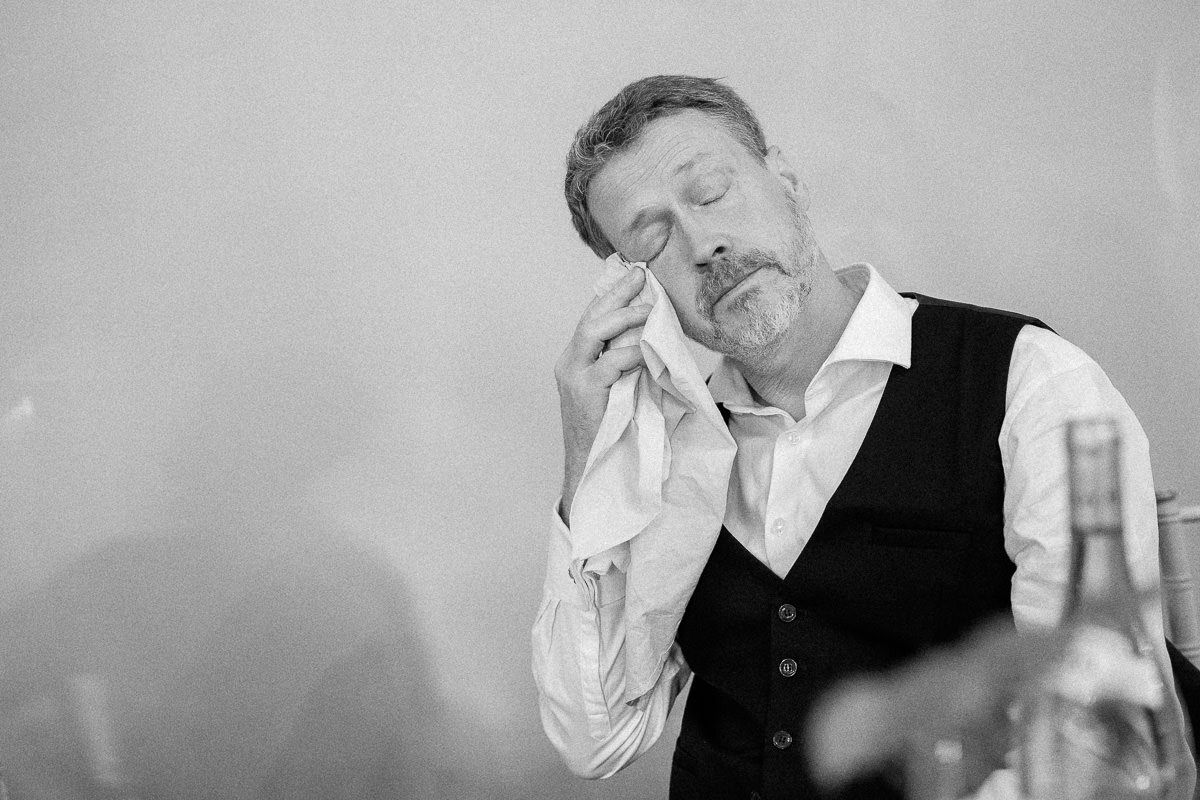 A black and white photo sequence shows someone performing a sneeze in multiple progressive stages.