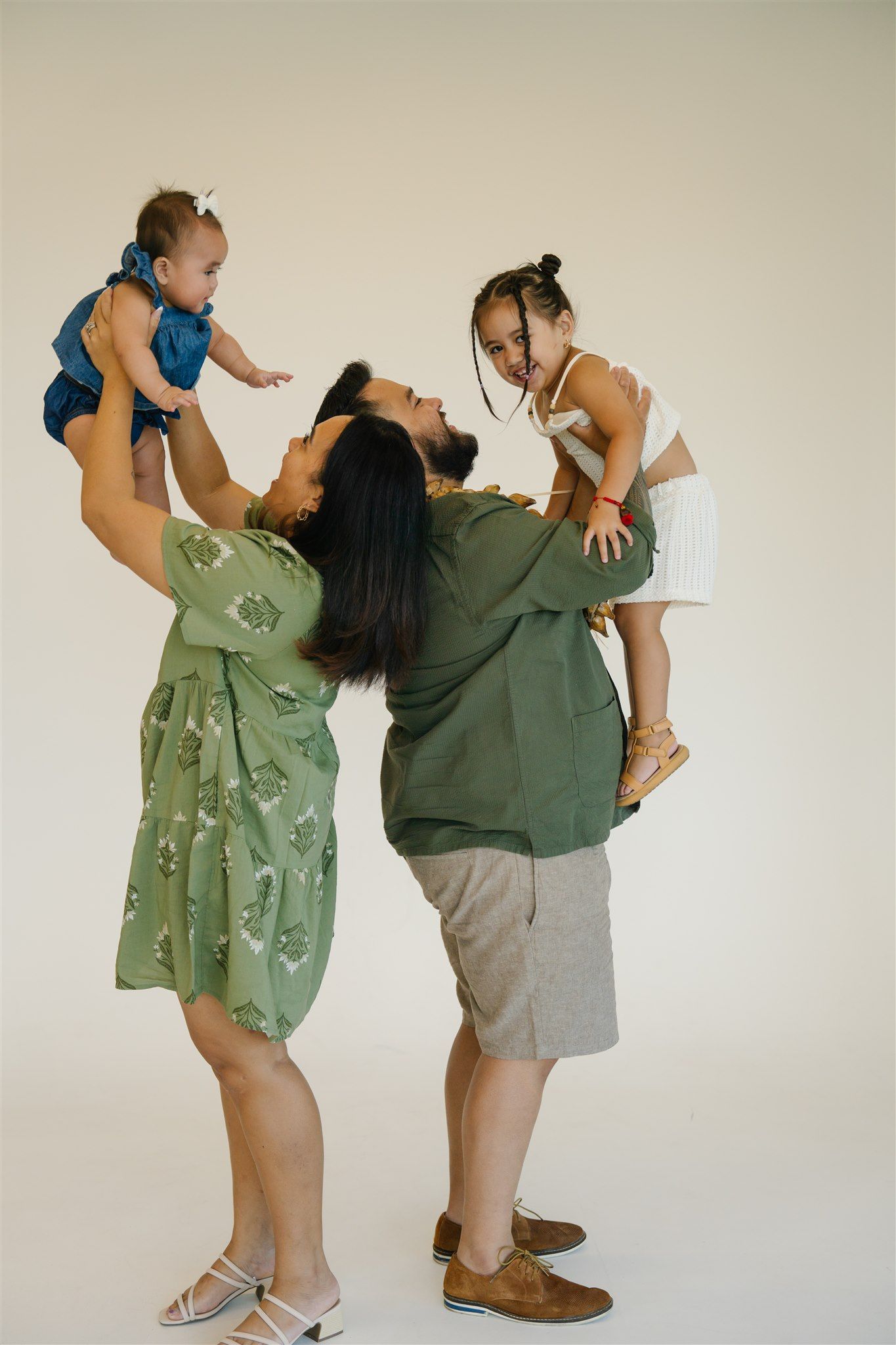 Playful family photo sequence showing joyful interactions in matching green outfits.