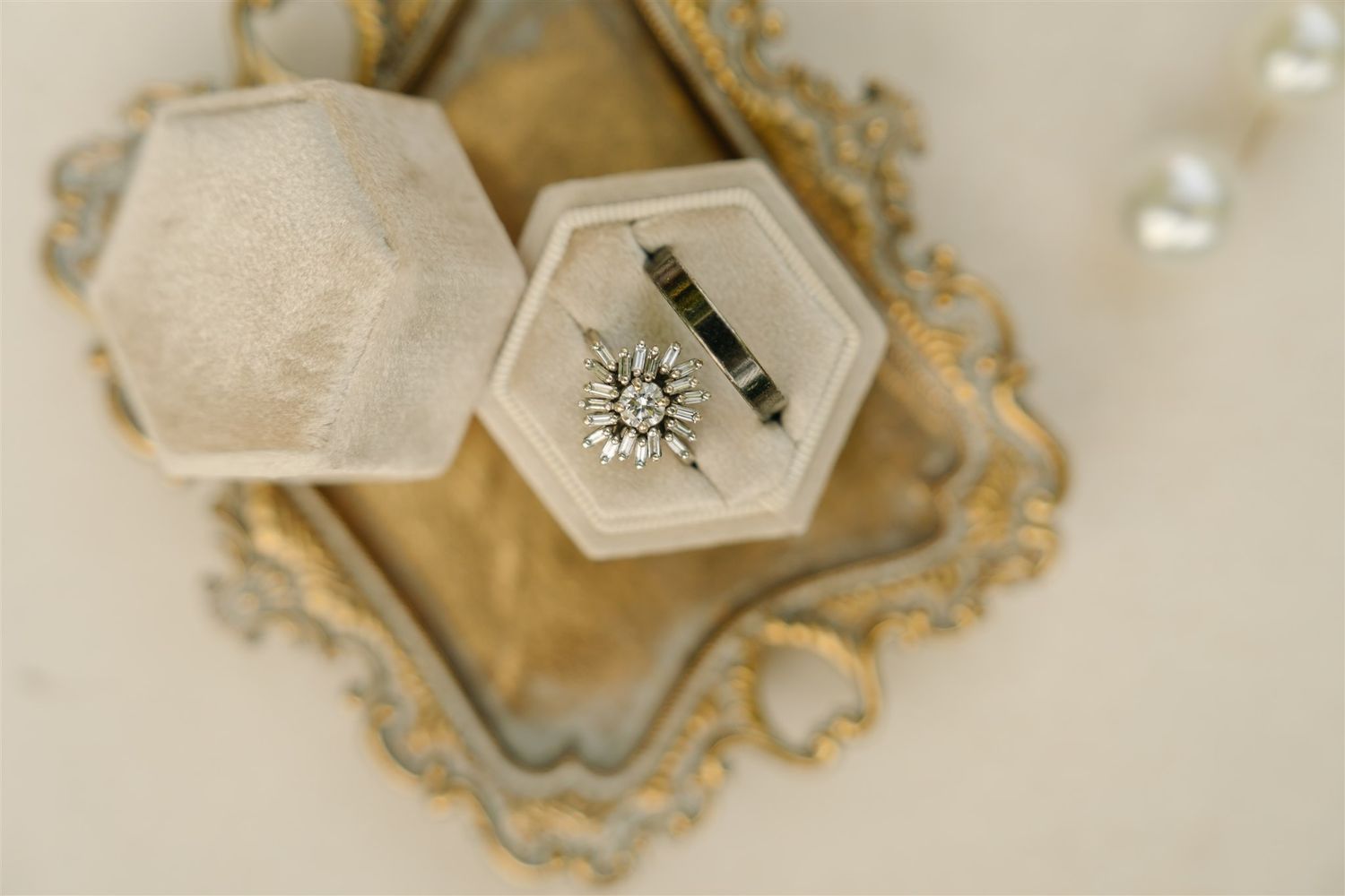 Vintage-inspired velvet ring box with floral engagement ring styled on ornate gold tray – wedding detail flat lay in Salt Lake City.