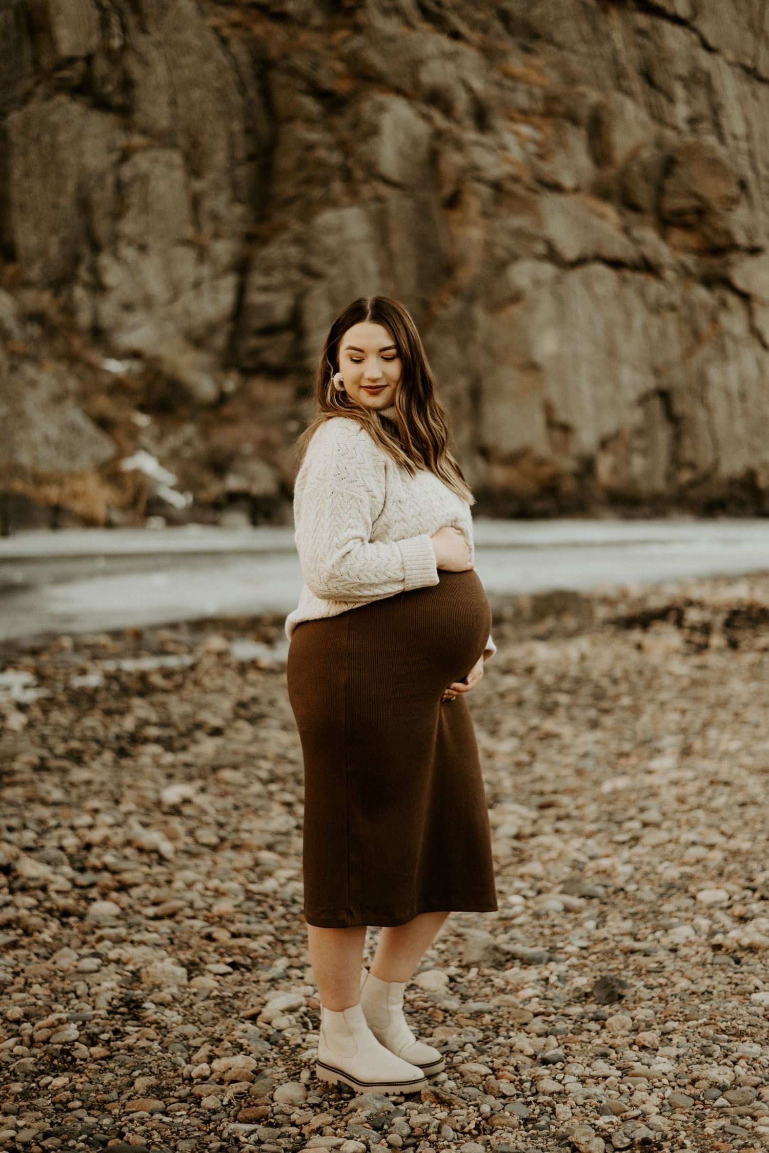 Photo of a pregnant woman in the Poudre Canyon in Colorado