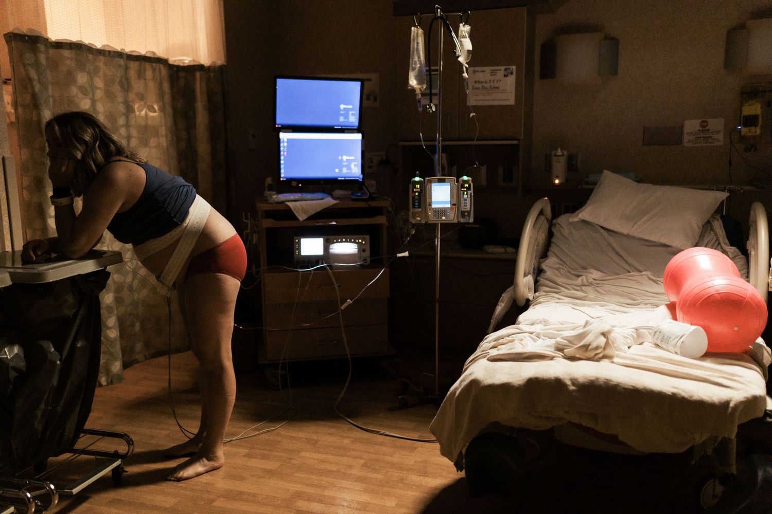 Birth photography of a mom holding her newborn in Boise