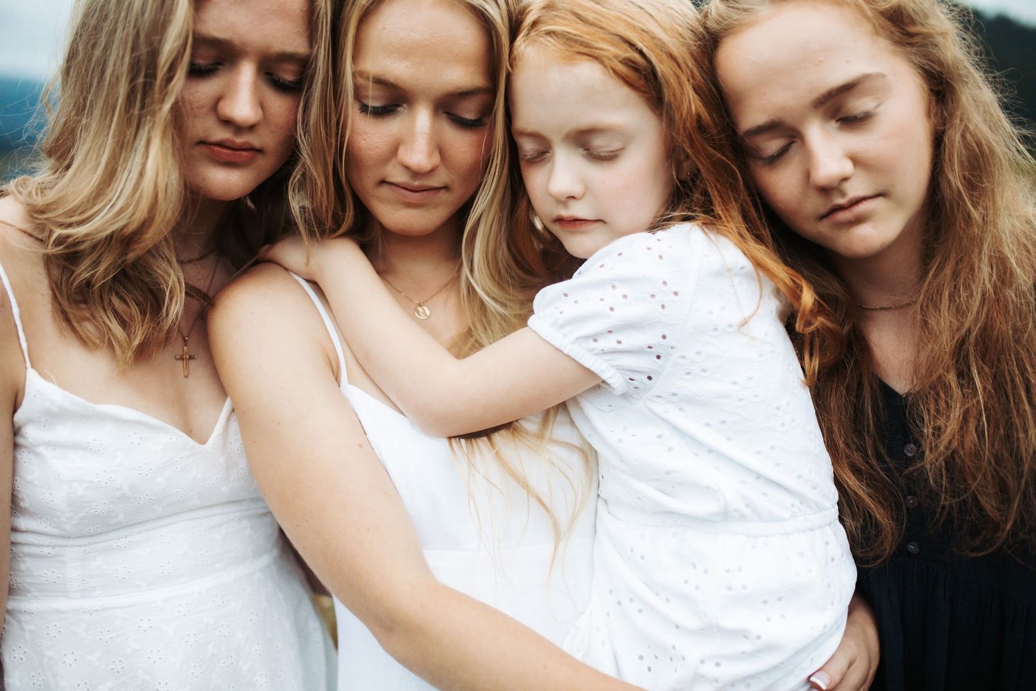 Sisters posing together for family photos