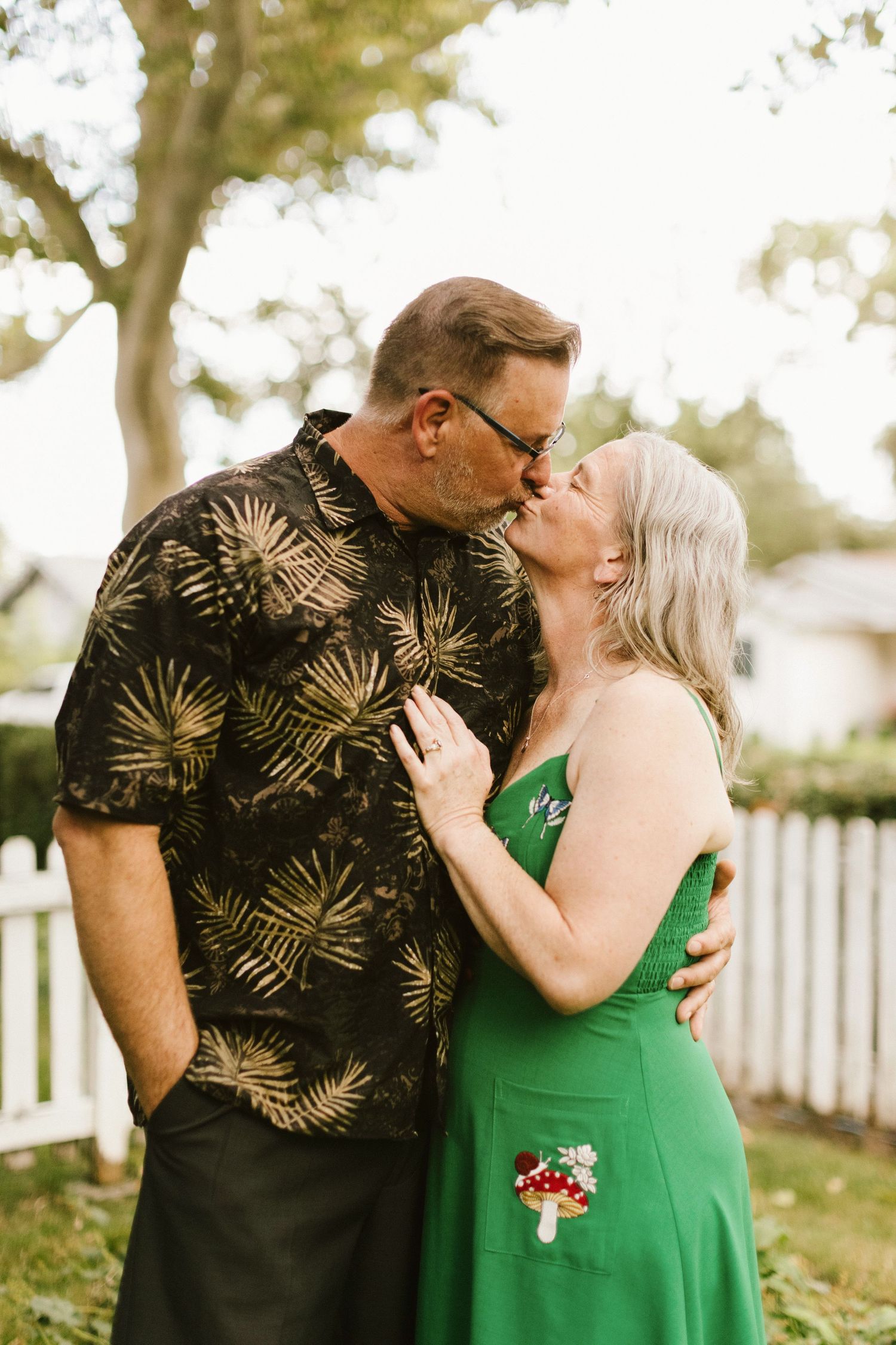 Couple posing closely together during a family photoshoot in the Boise North End