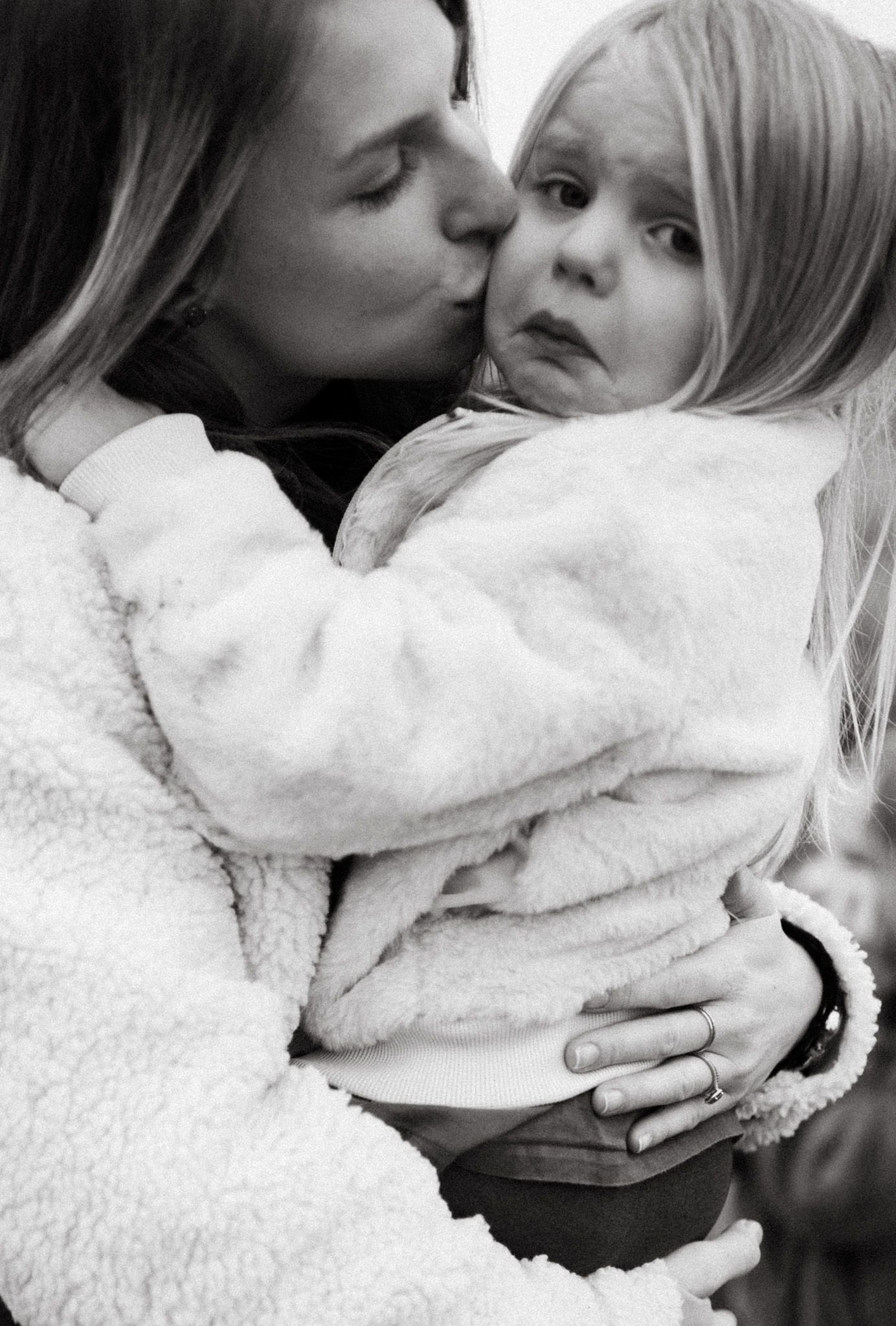 mother with child during family photoshoot