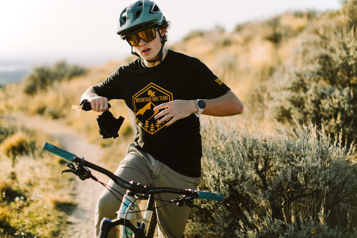 Senior photoshoot mountain biking in Boise