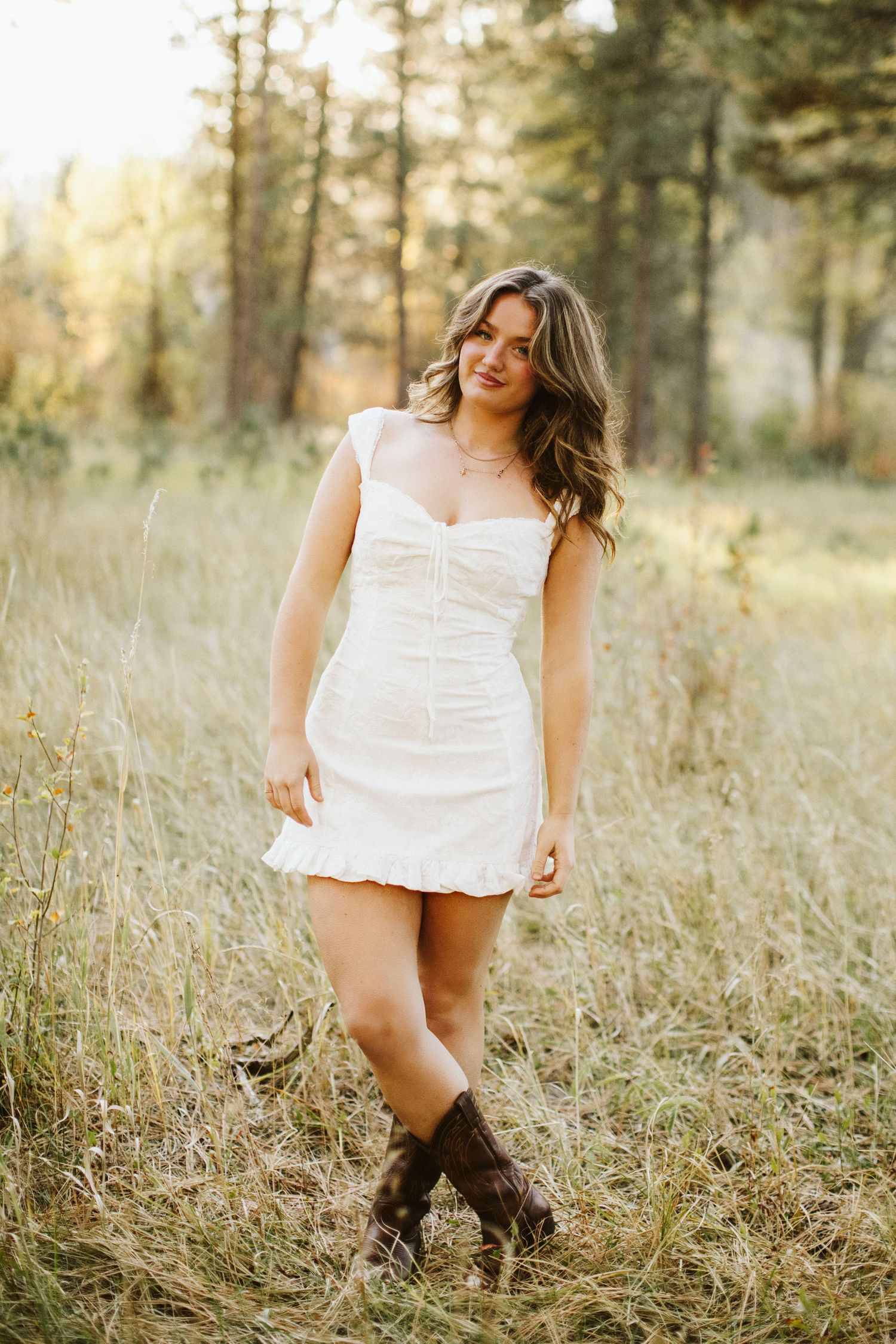 Posed portrait of young woman for senior photoshoot at Robie Creek