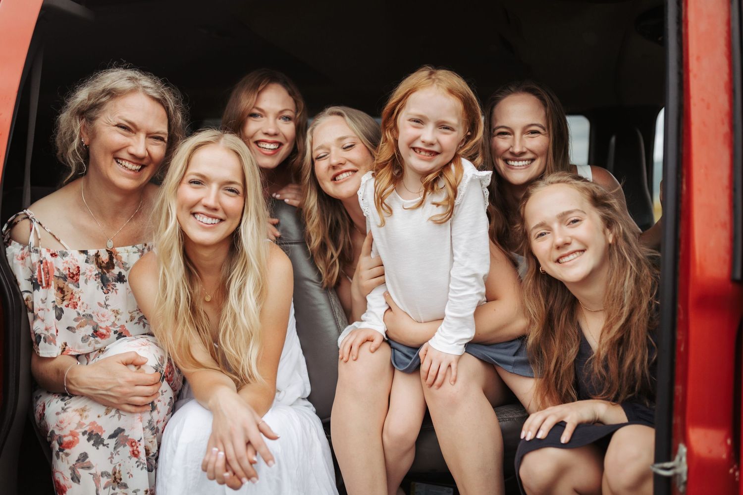 Mom and daughters posing for a photo together in Cascade Idaho