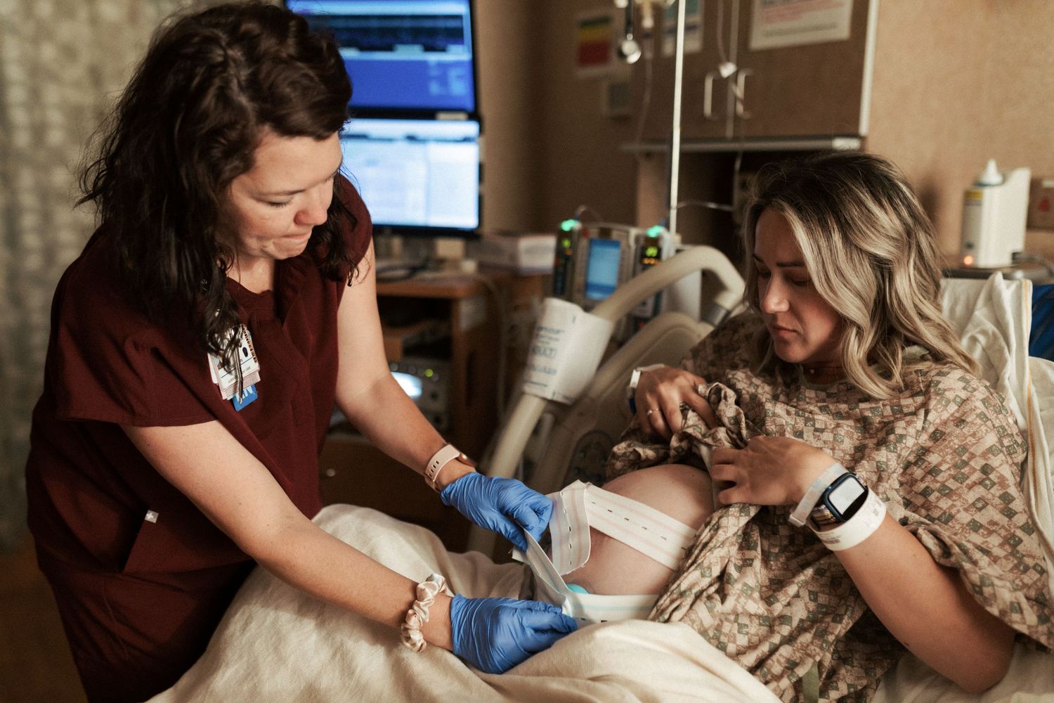 Birth photography of a mom holding her newborn in Boise