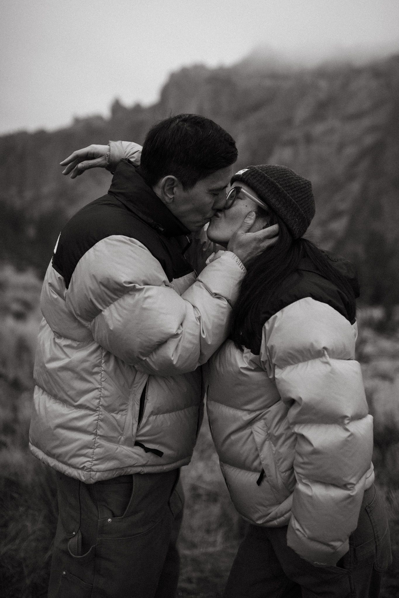 Couple kissing for a photo session in Smith Rock State Park