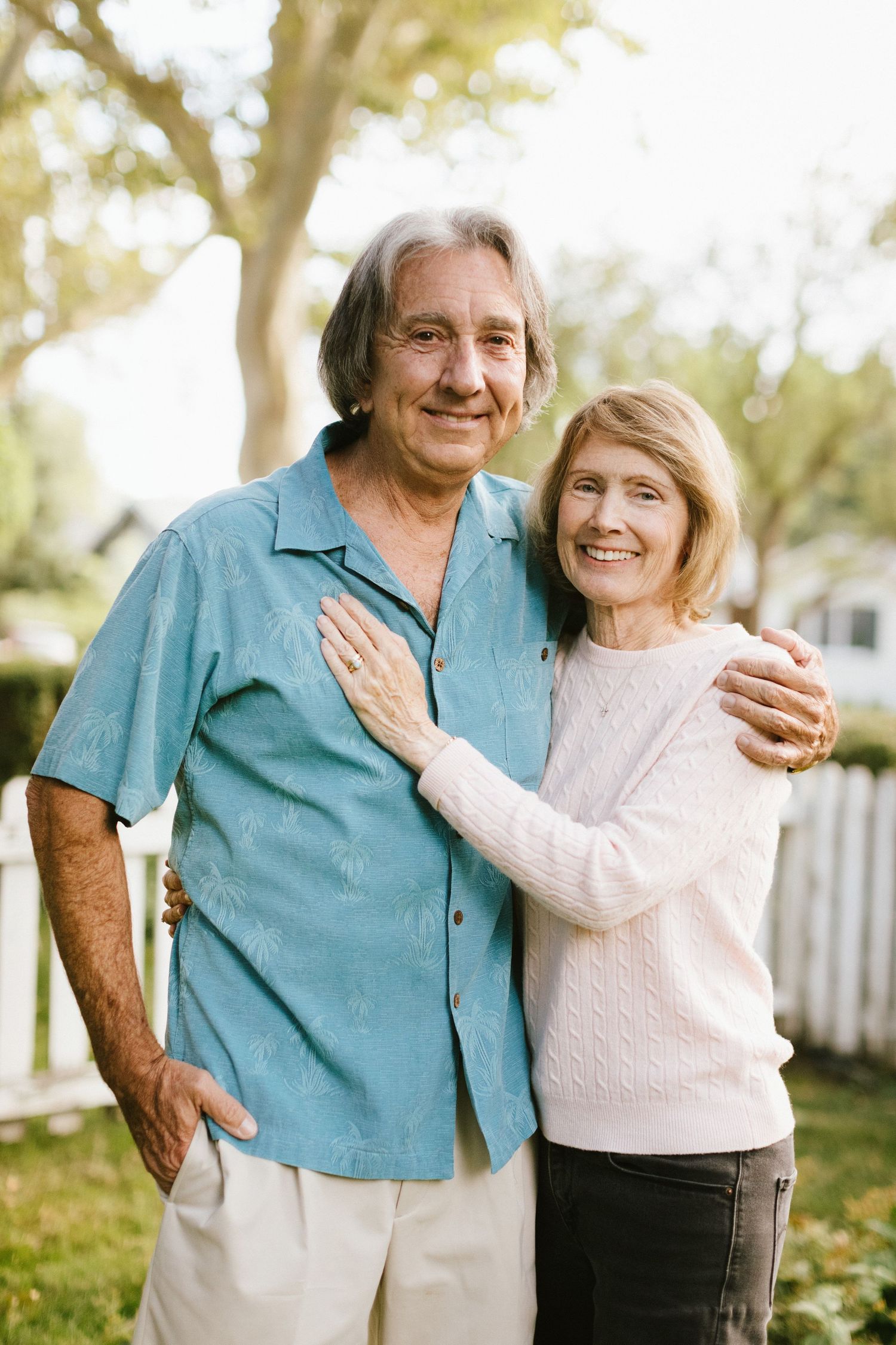 Couple posing closely together during a family photoshoot in the Boise North End