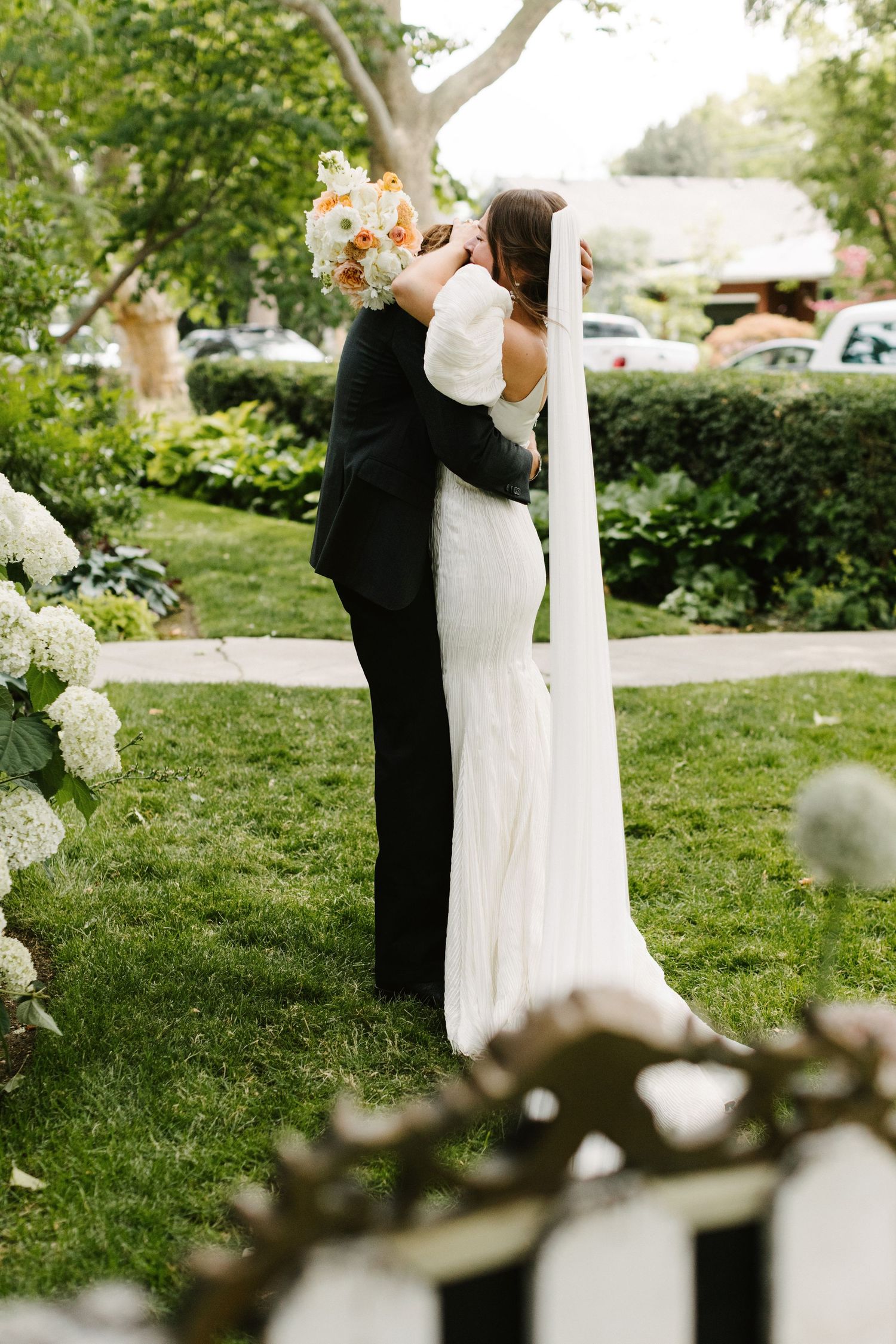 Bride and Groom sharing a teary intimate moment together after leaving the alter and getting married in Boise Idaho