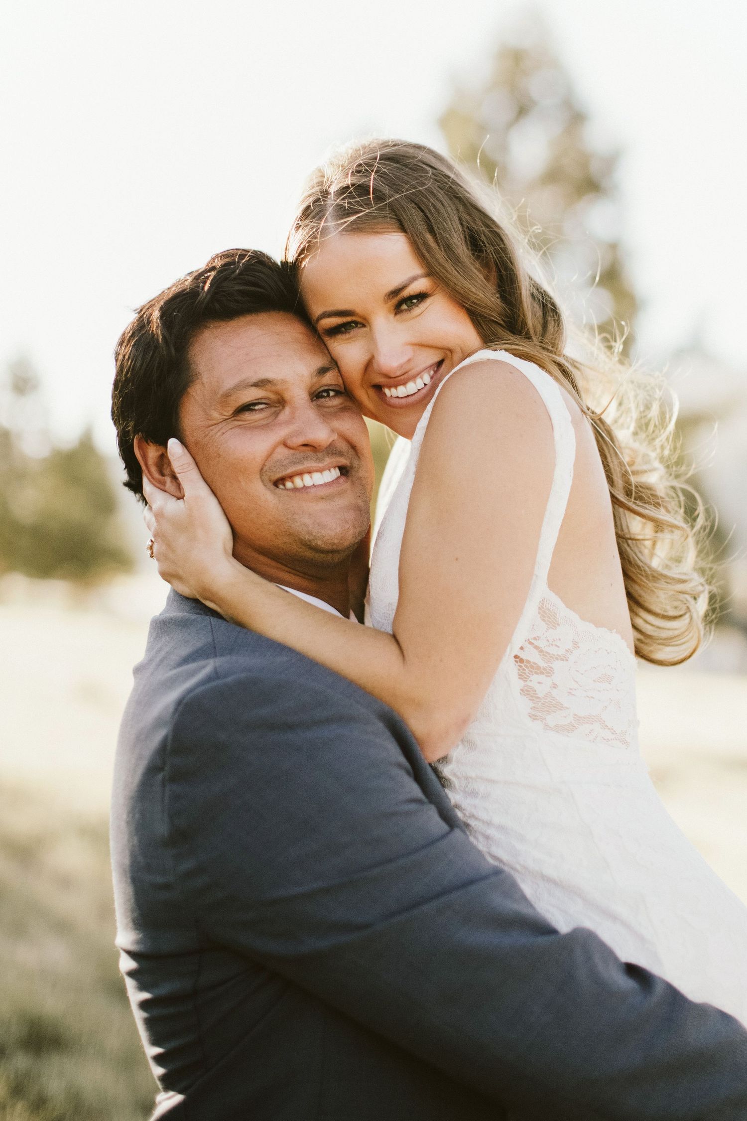 Newlyweds standing for portraits in Big Bear California