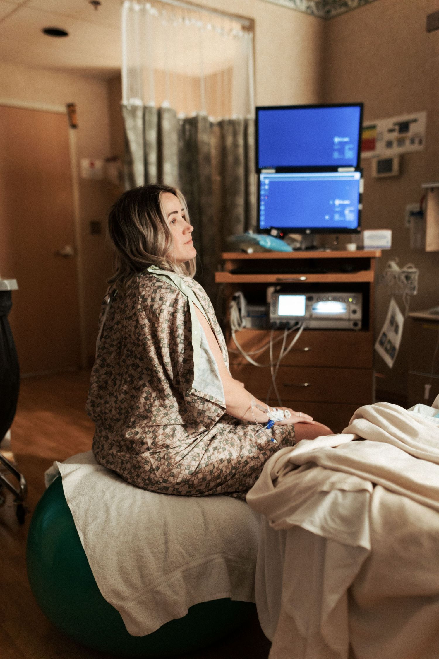 Birth photography of a mom holding her newborn in Boise