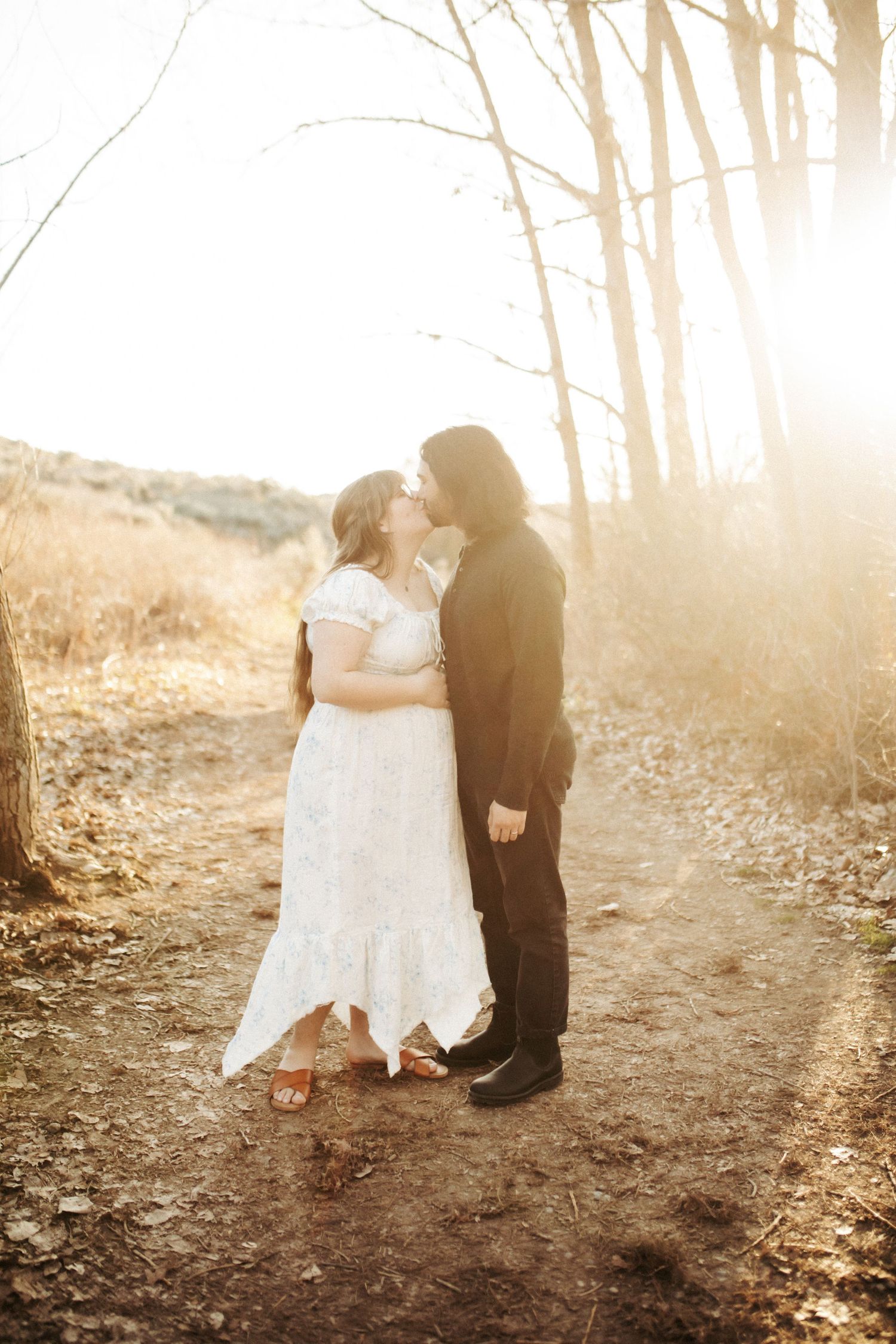 Wife and husband posing for family photos in Boise