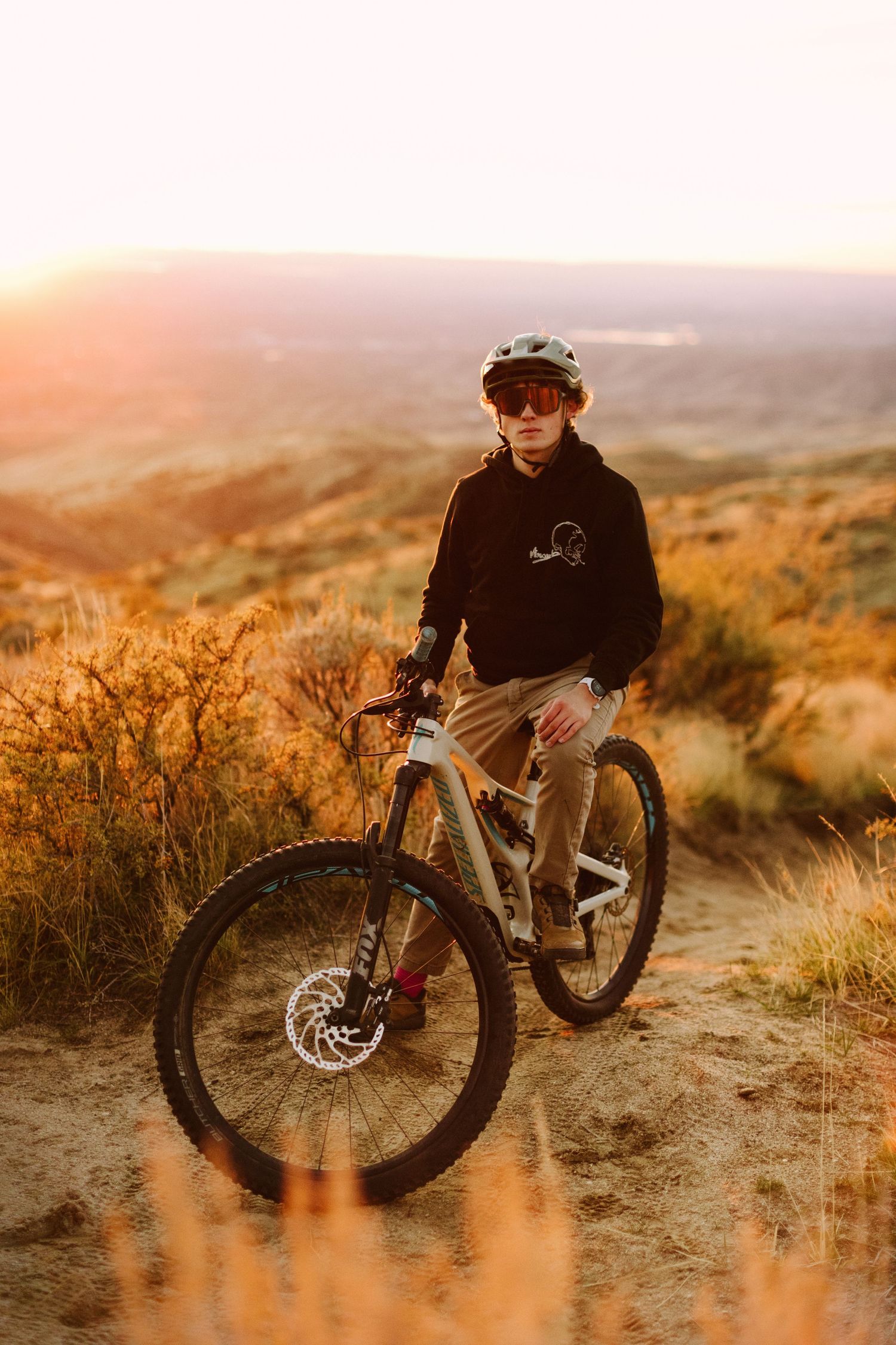 Senior photoshoot mountain biking in Boise