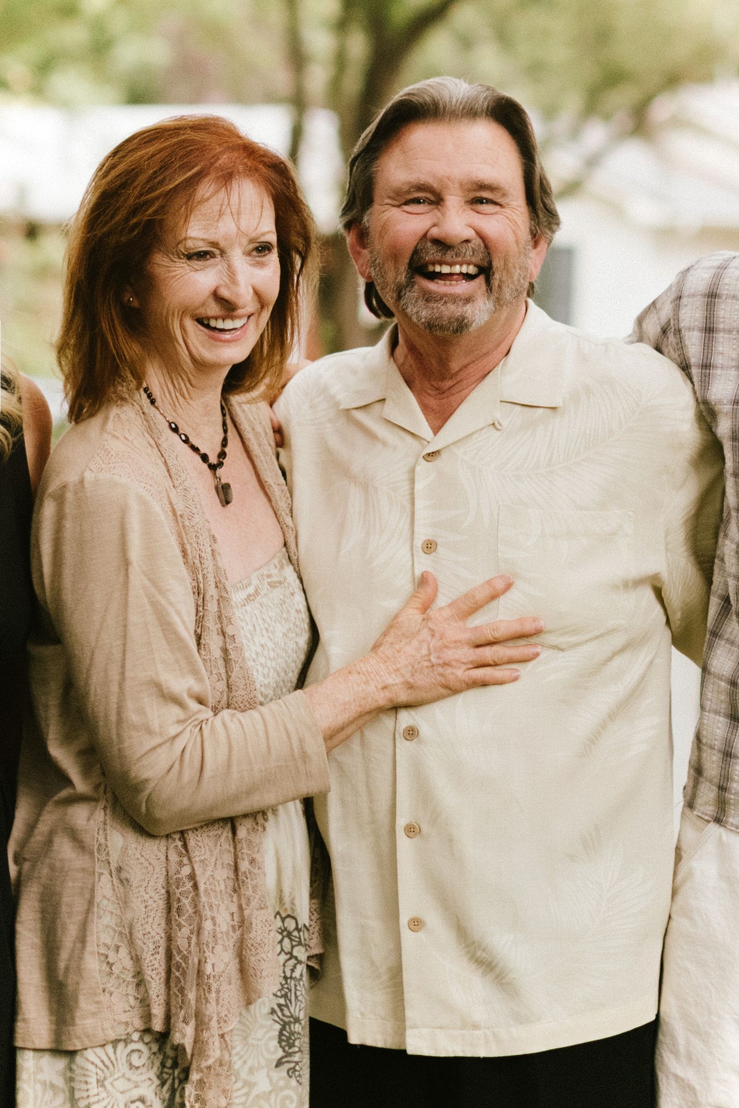 Couple posing closely together during a family photoshoot in the Boise North End