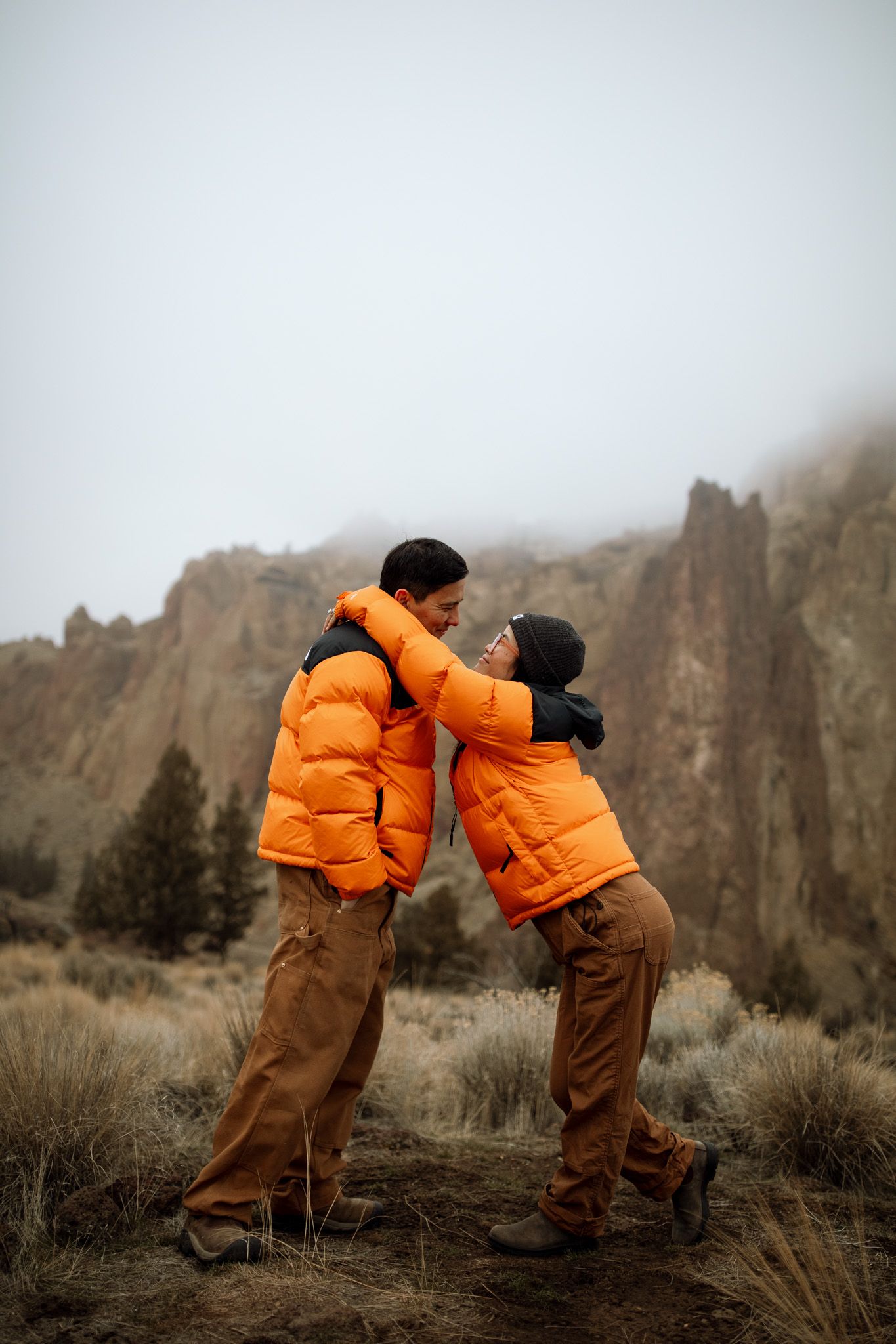 Girl leaning against her husband for a couples photo session in Redmond Oregon