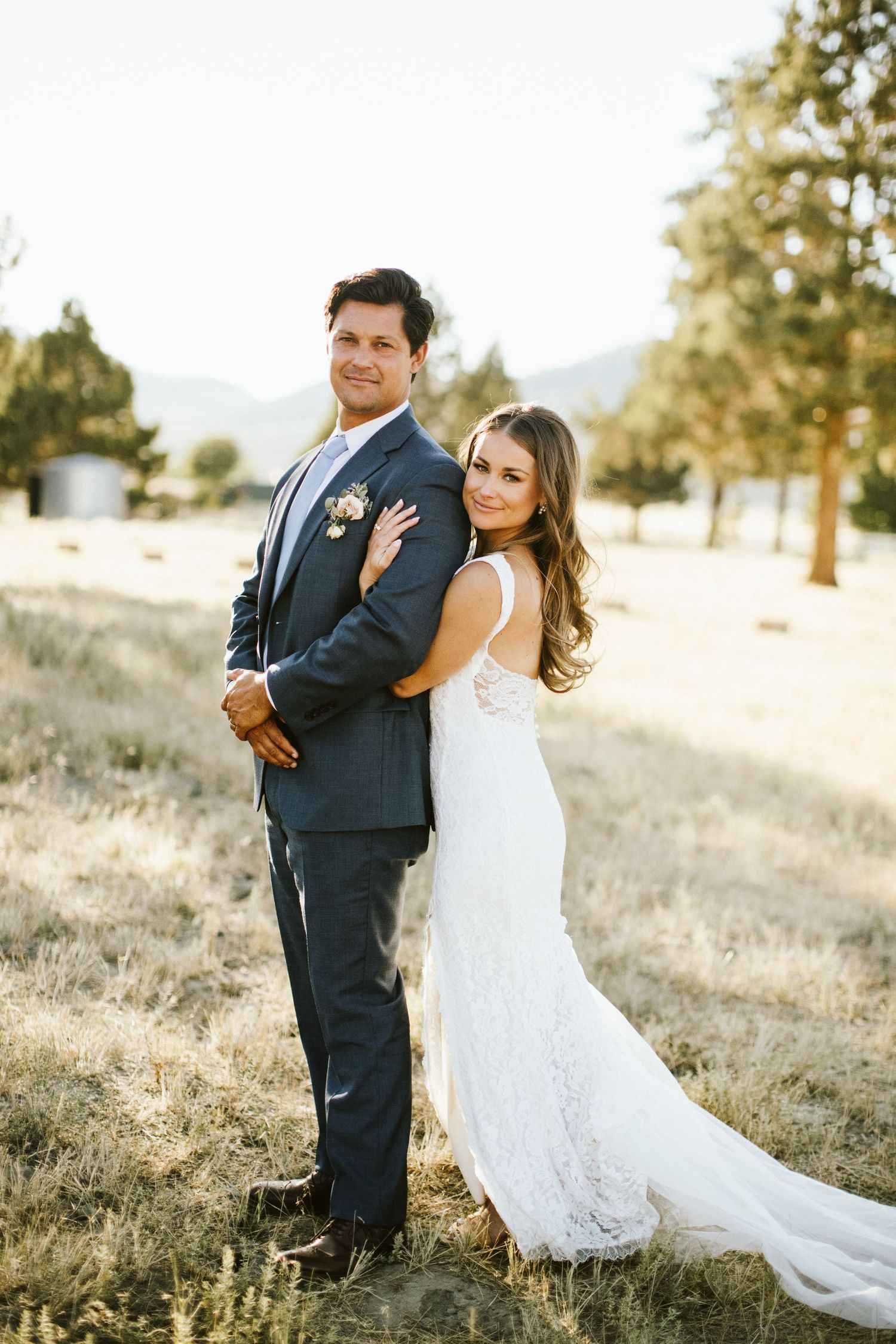 Bride and Groom standing together for portraits at Shay Meadow Ranch in Big Bear California
