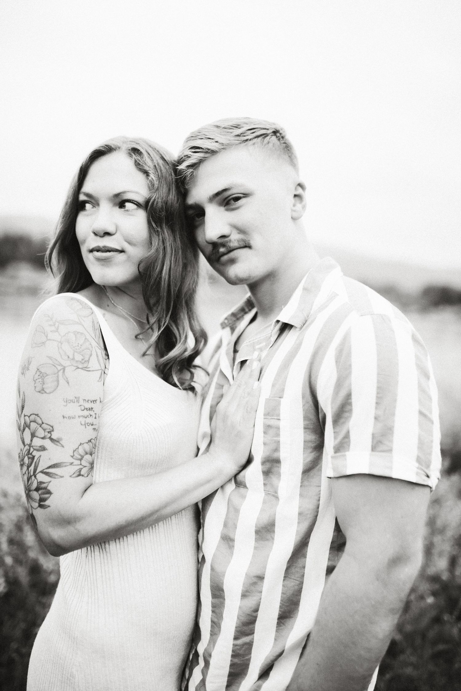 Intimate black and white engagement portrait