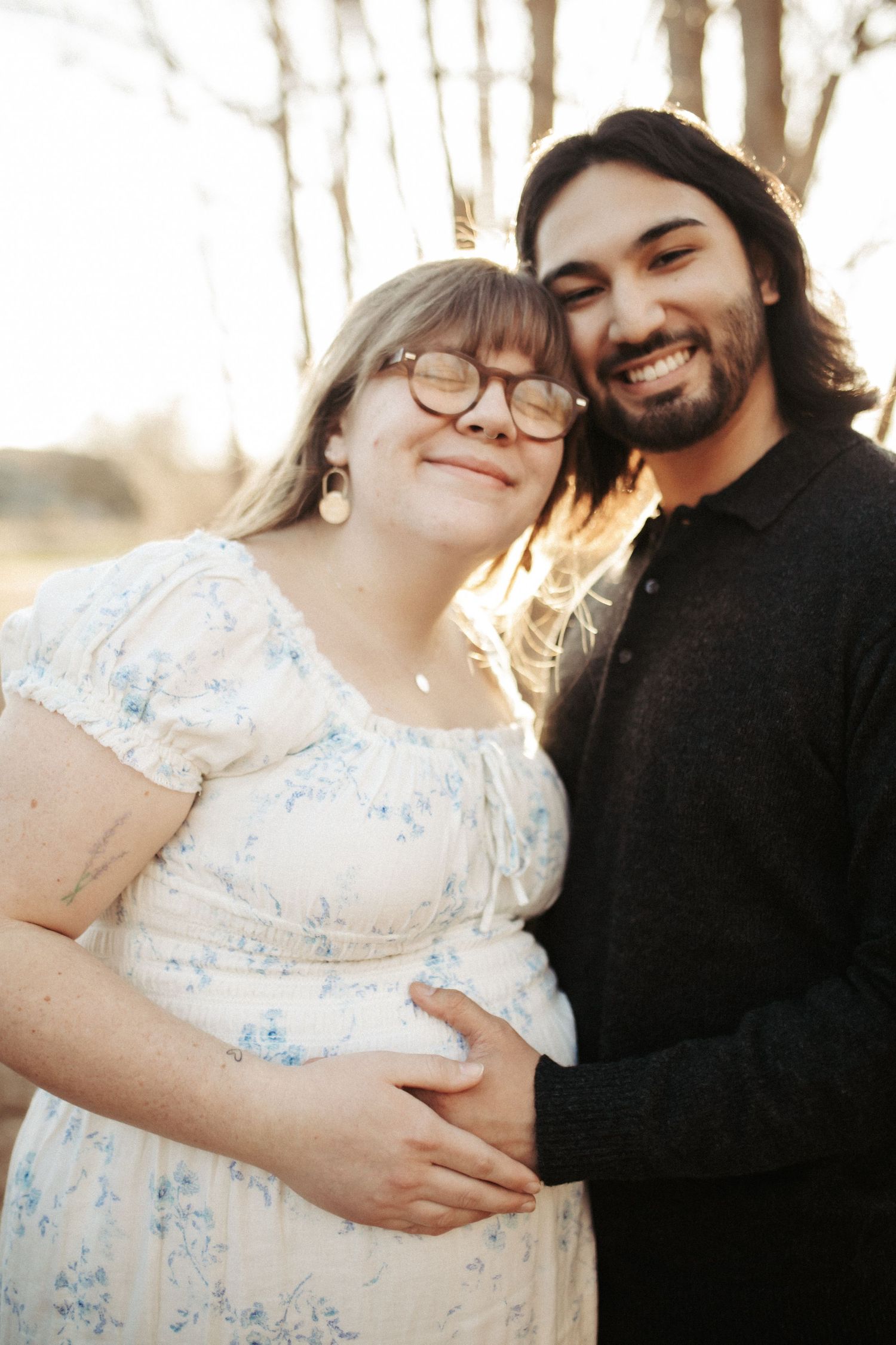 Wife and husband posing for family photos in Boise