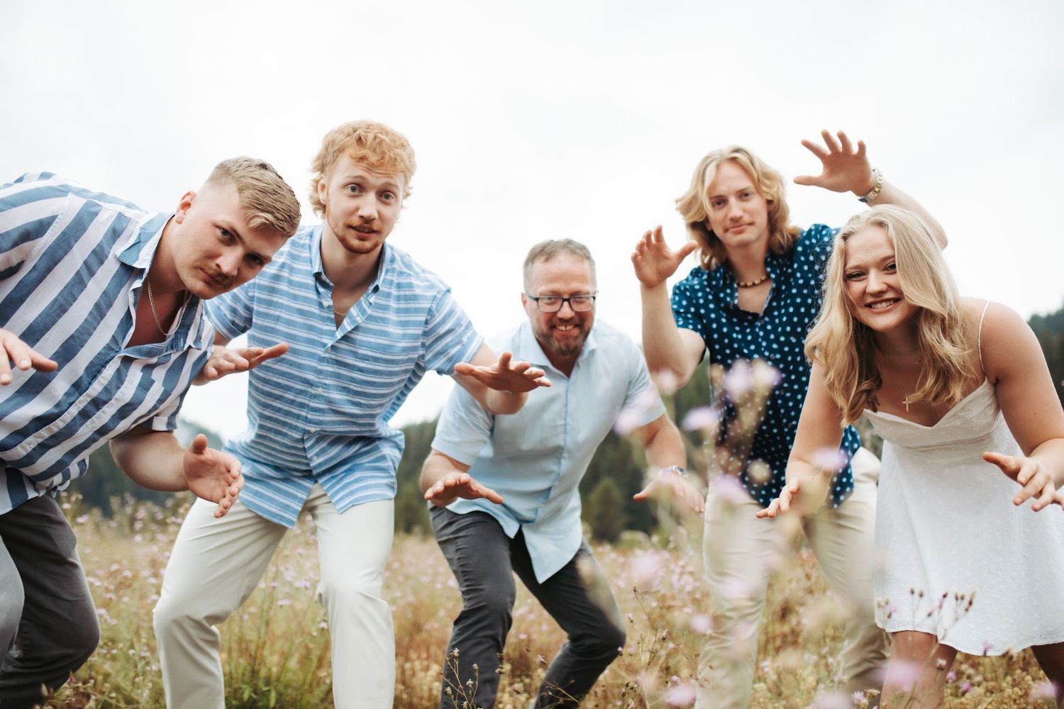 Dad and kids playing together for family photos