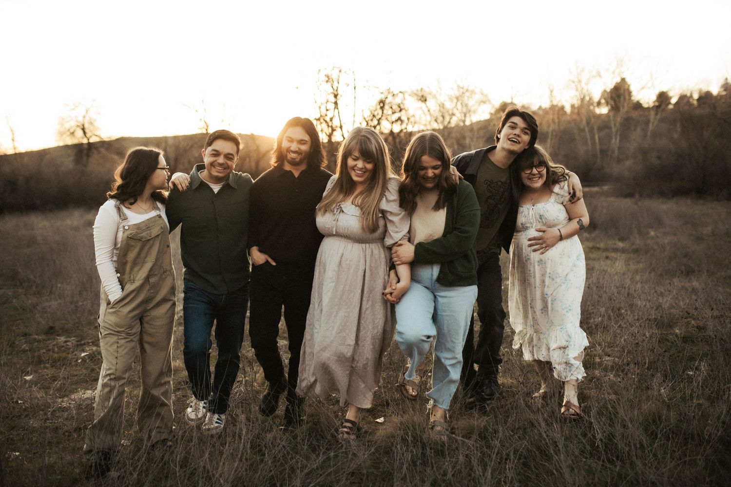 Family walking together for portraits in Boise