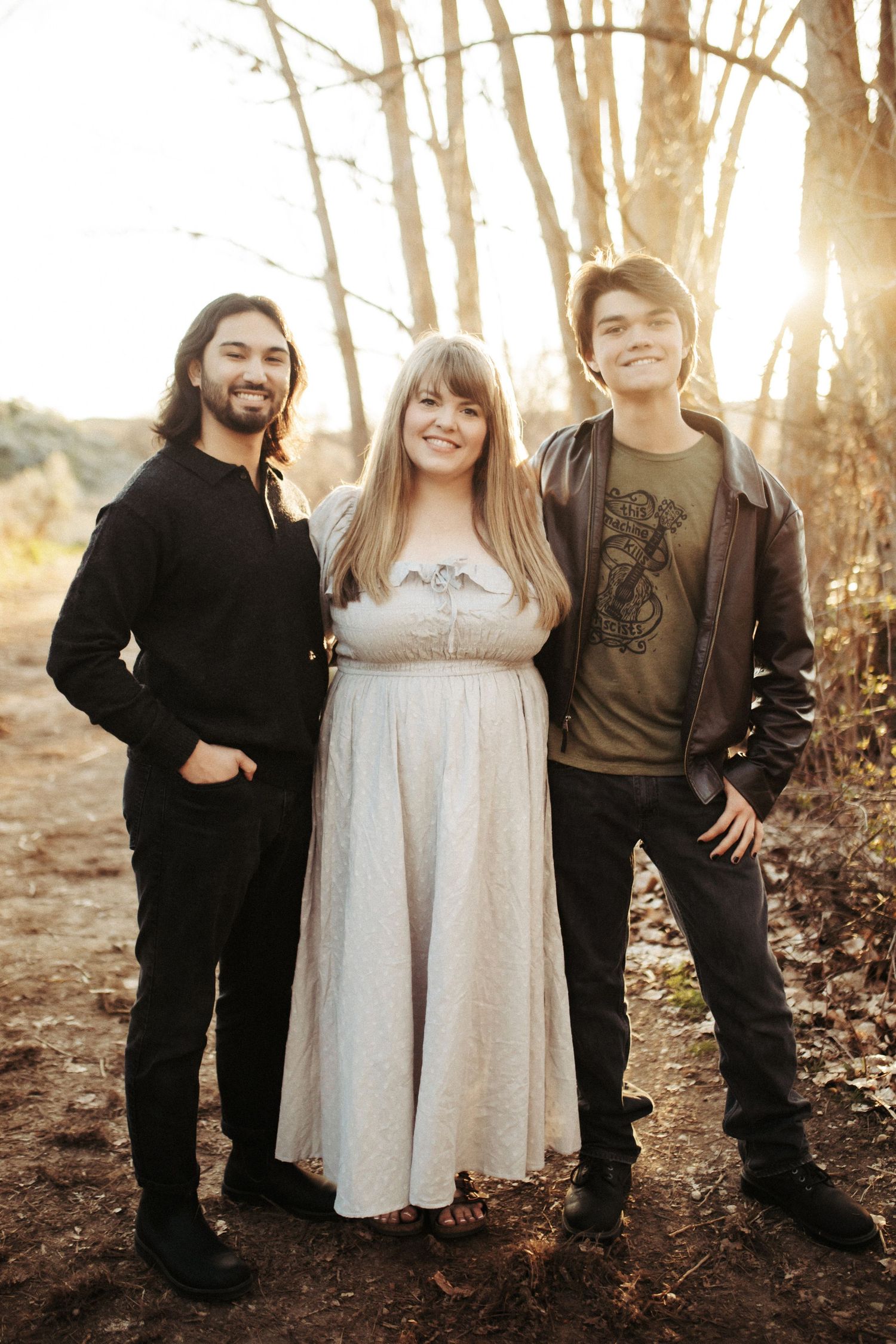 Mom posing with her sons for family photos in Boise