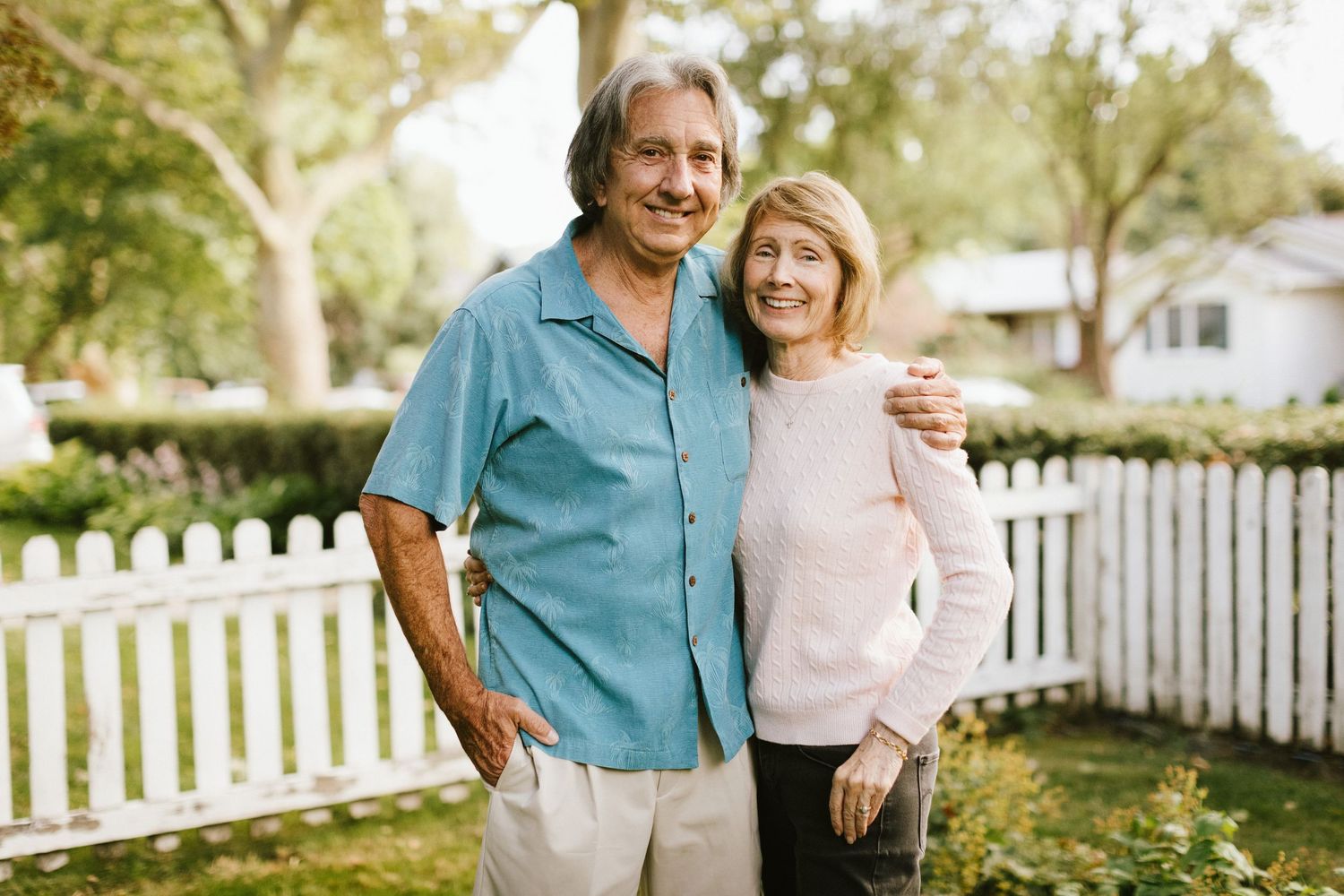 Couple posing closely together during a family photoshoot in the Boise North End