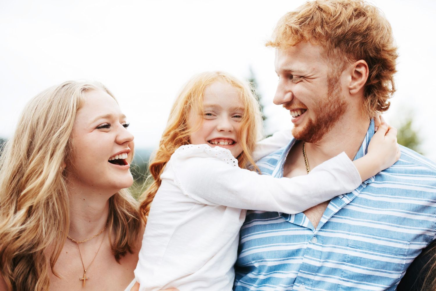 candid image of siblings laughing together