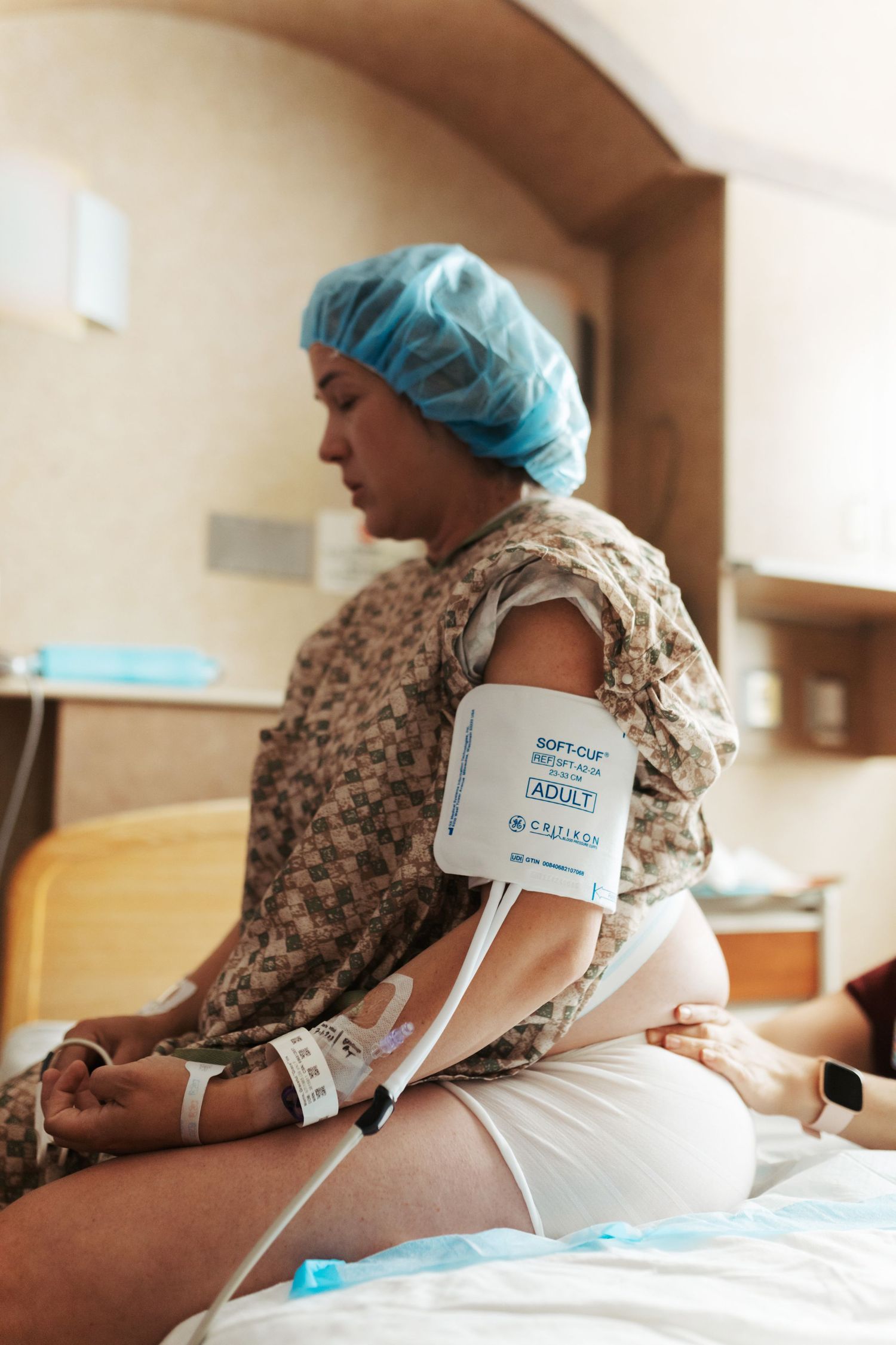 Birth photography of a mom holding her newborn in Boise