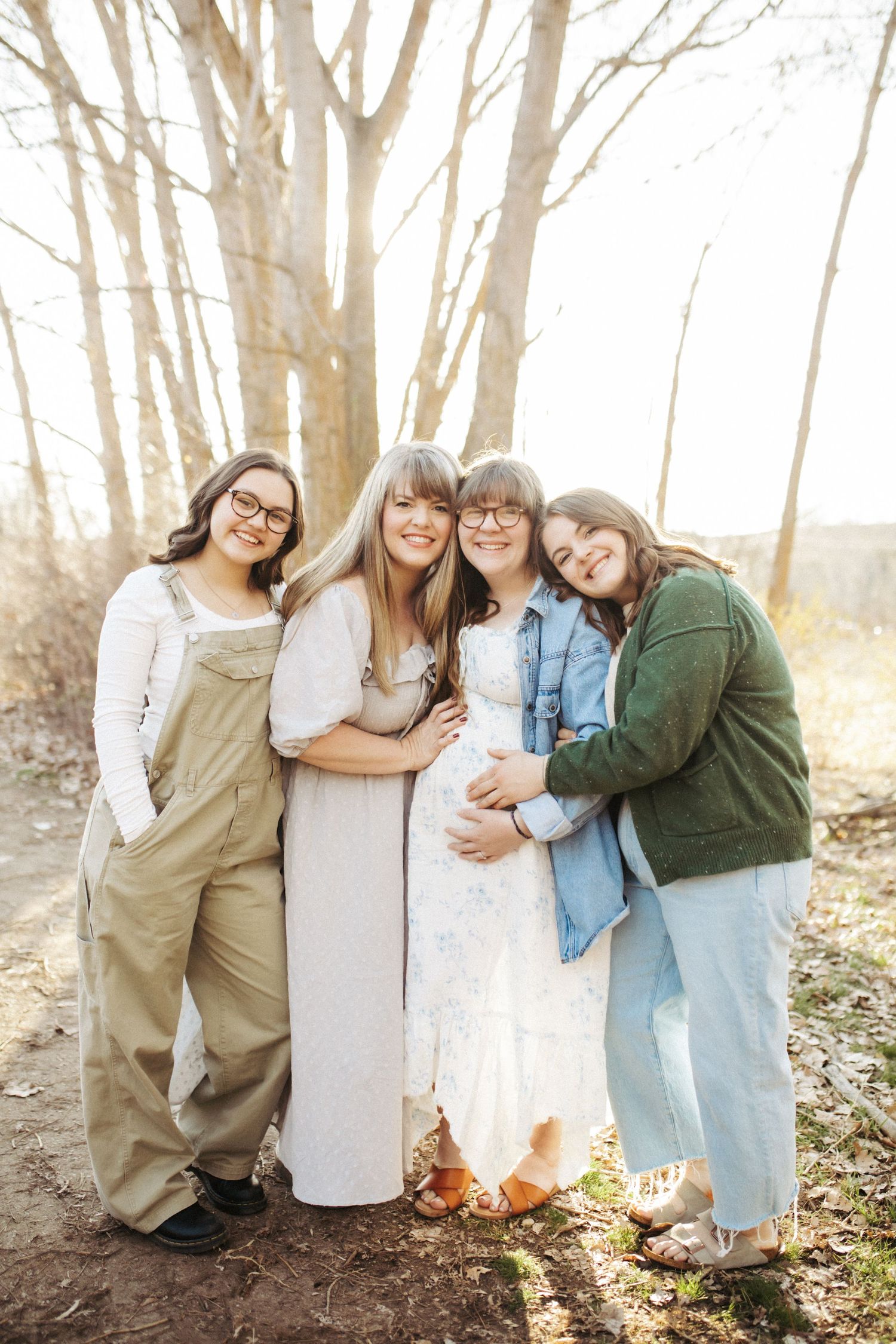 Mother standing with her daughters for family photos in Boise