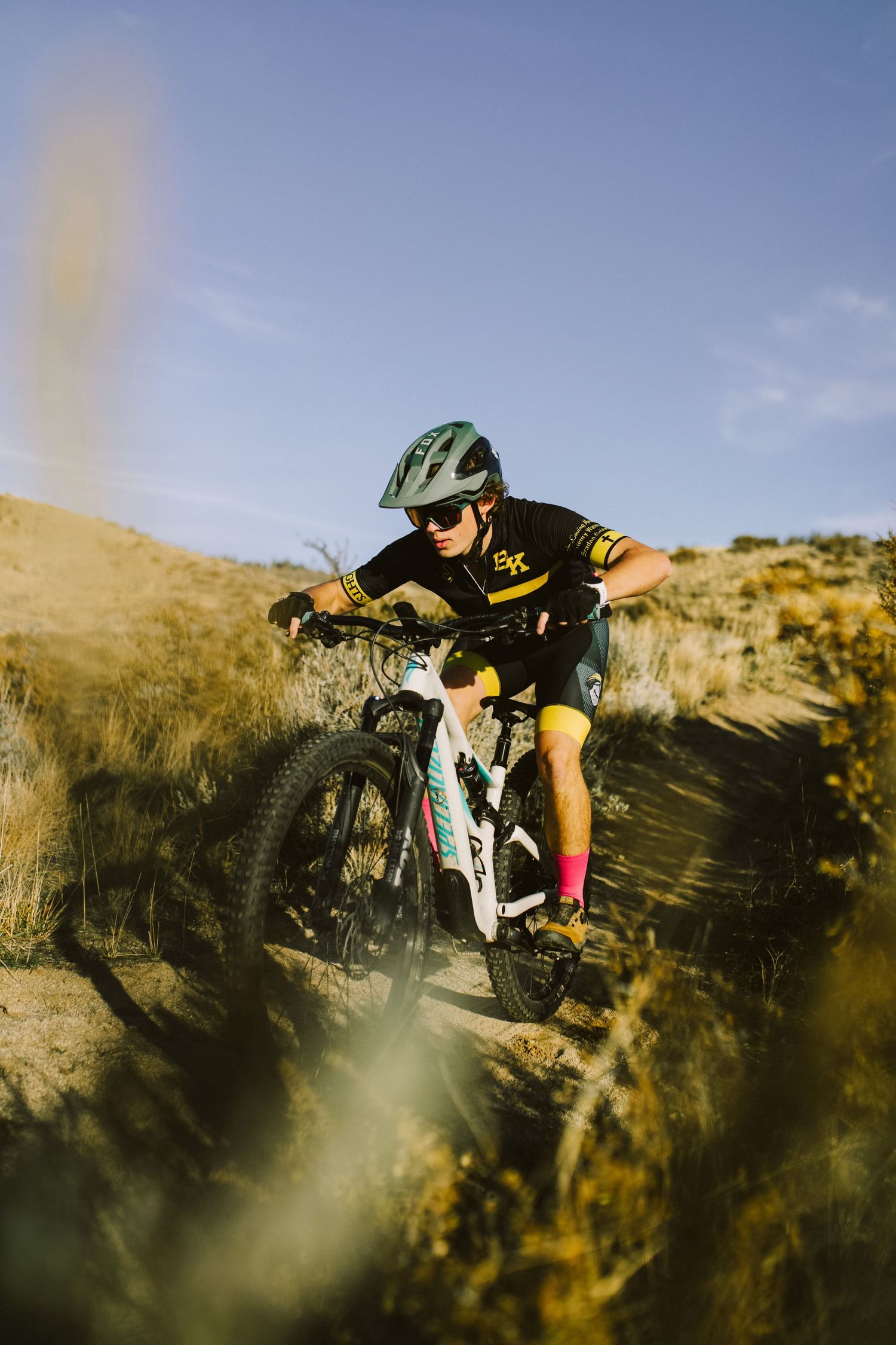 Senior photoshoot mountain biking in Boise