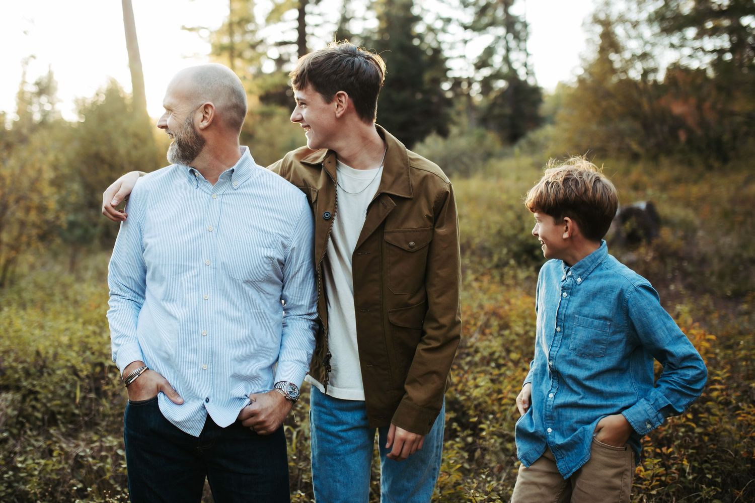 Candid photograph of father and his sons in McCall
