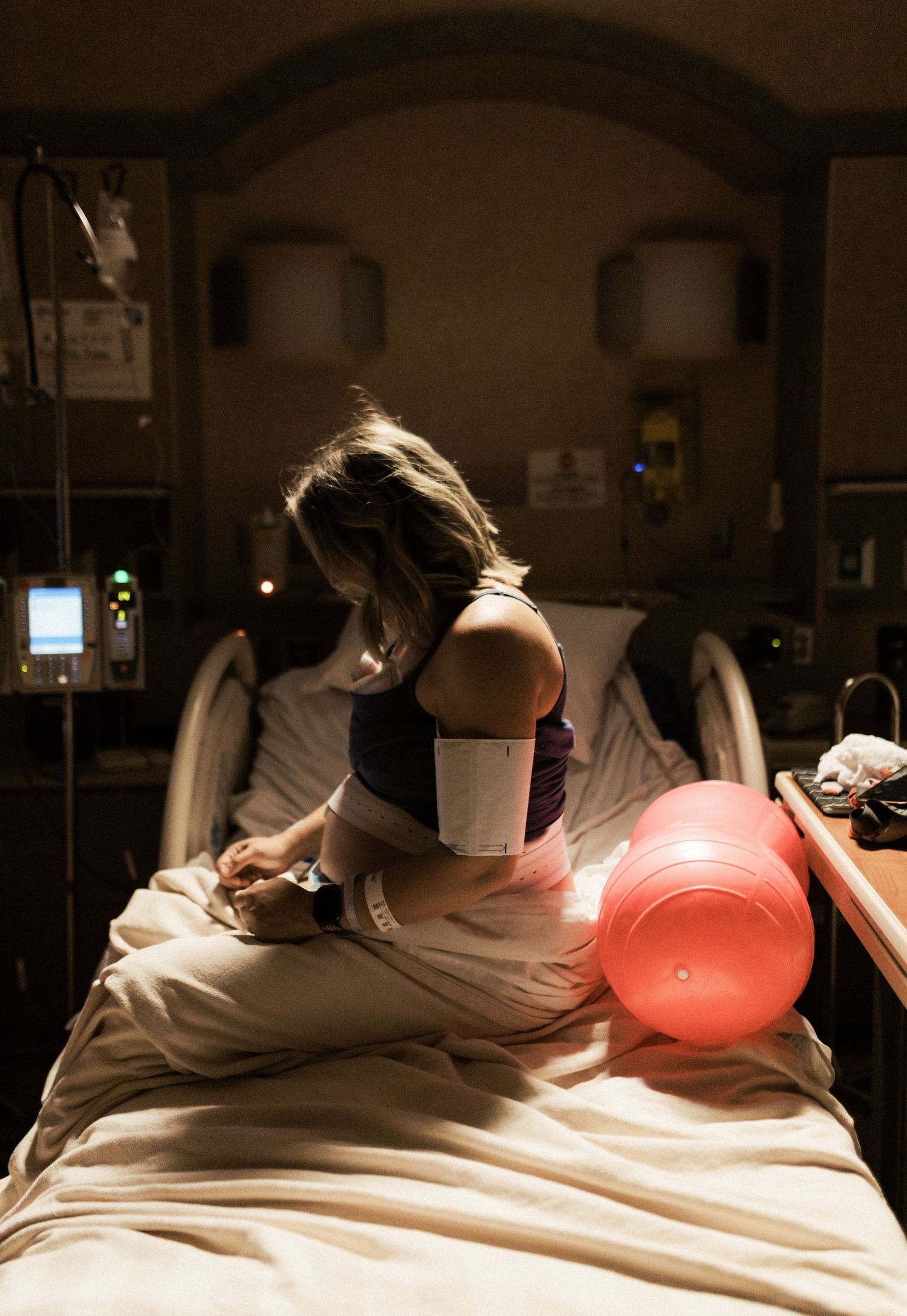 Birth photography of a mom holding her newborn in Boise